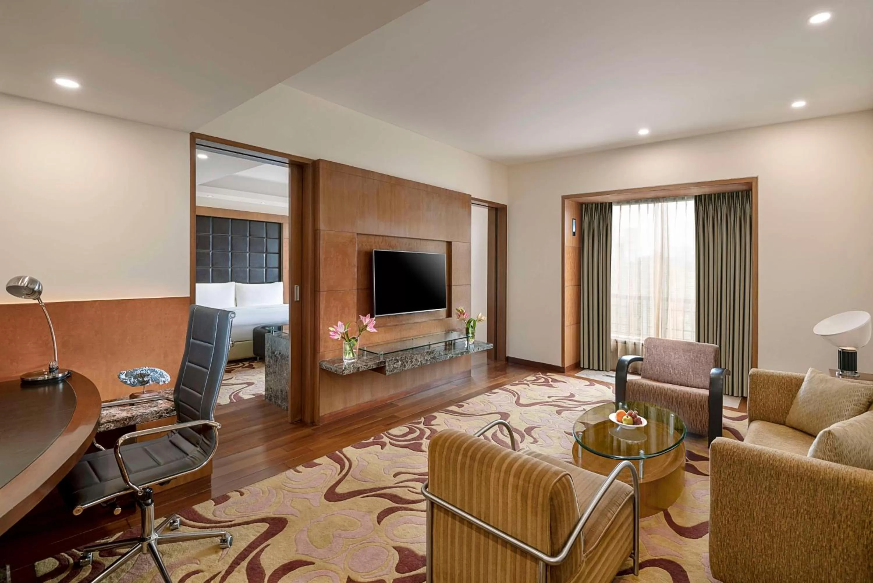 Suite 1 Bed with Airport Transfers, Happy Hours 01:00 PM to 06:00 PM Free Pick up and drop to Worldmark Aerocity (subject to car availability) in Radisson Blu Plaza Delhi Airport