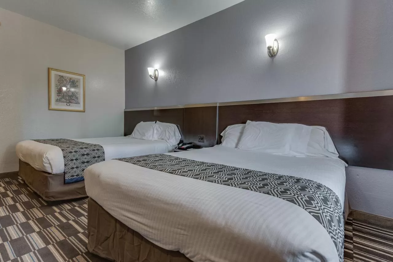 Queen Room with Two Queen Beds - Smoking in Microtel Inn & Suites by Wyndham Oklahoma City Airport