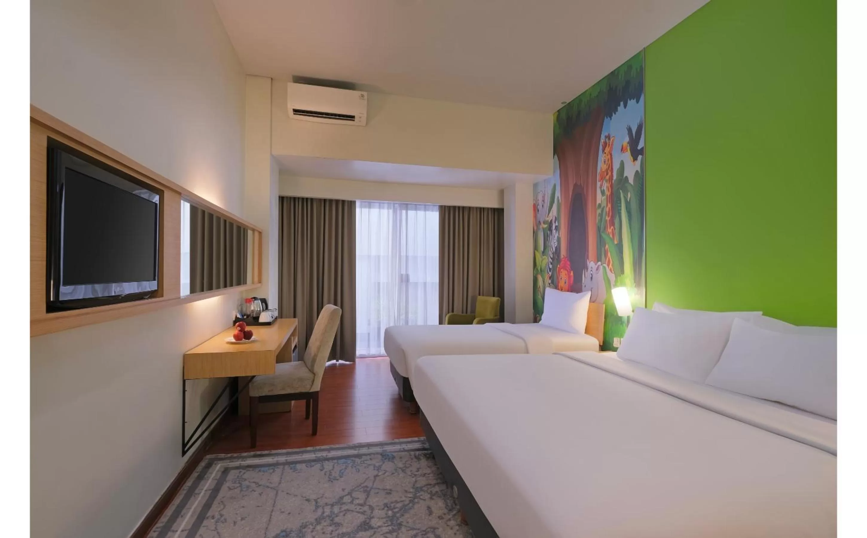 Family Room in Quest Hotel Simpang Lima - Semarang by ASTON