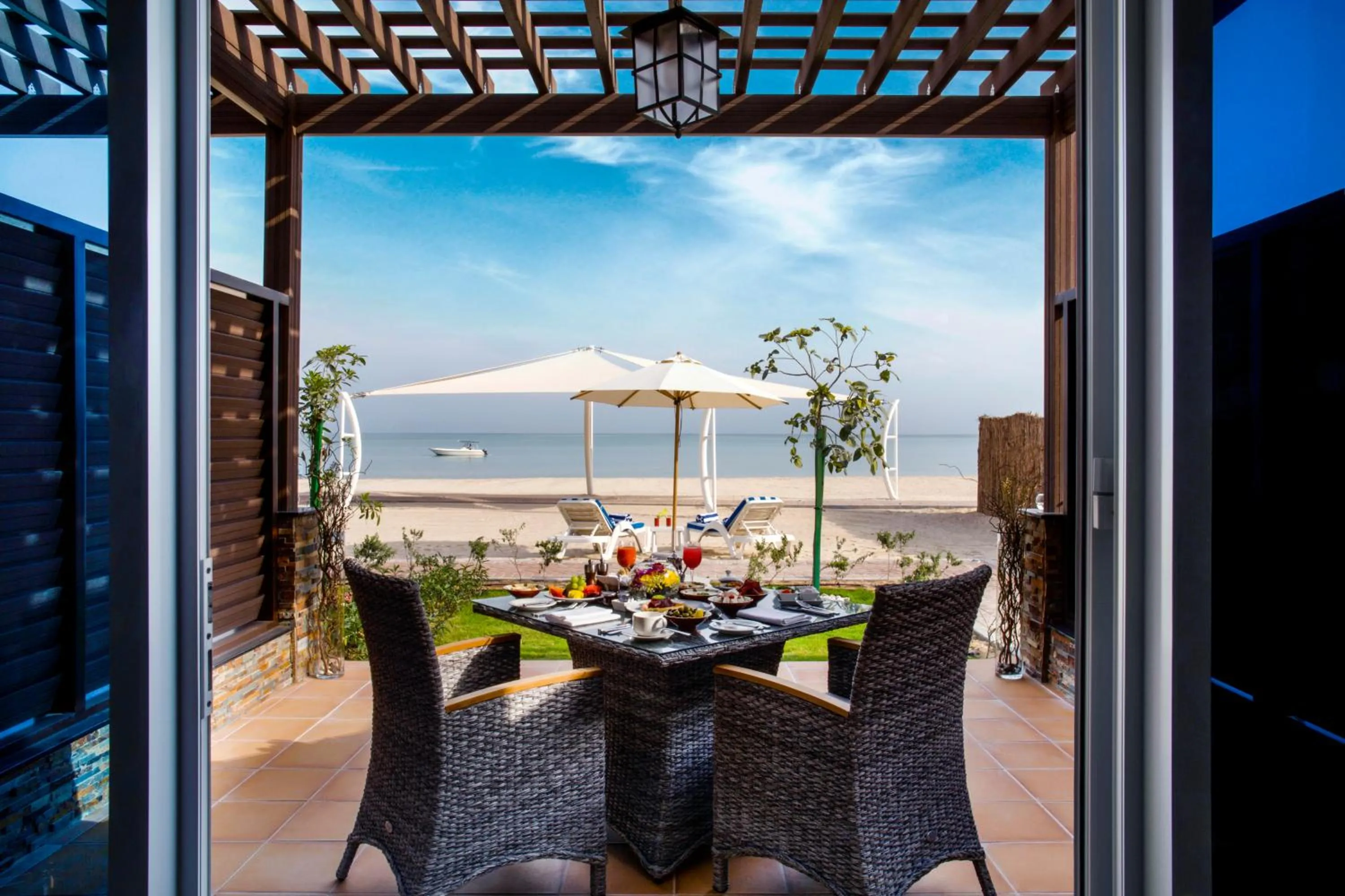 Premium Beachfront Chalet King Room with Garden Private Terrace And Parking  in Danat Jebel Dhanna Resort