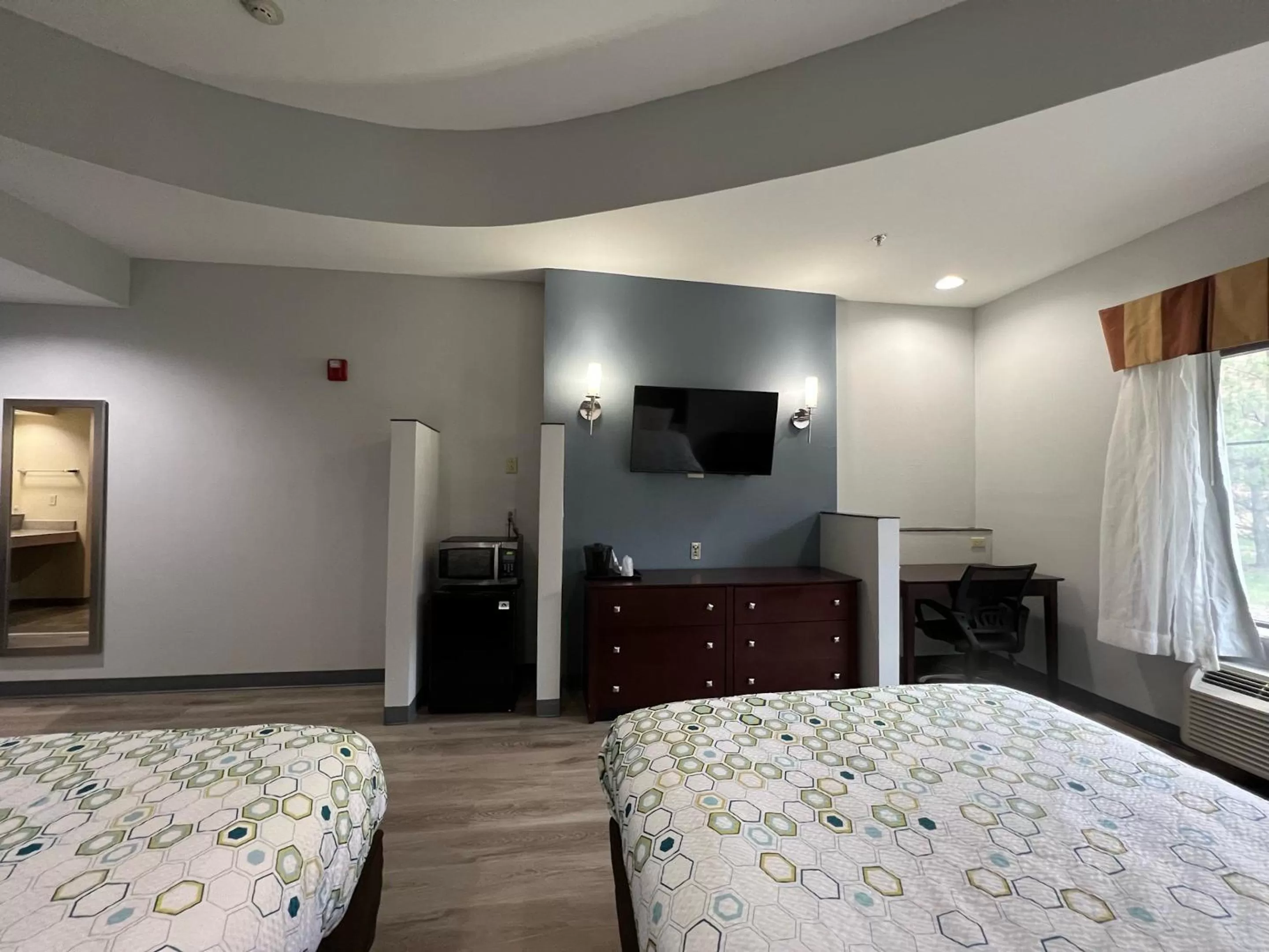 Suite with One King Bed and One Double Bed with Kitchenette Non-Smoking in HomeTowne Studios & Suites Washington