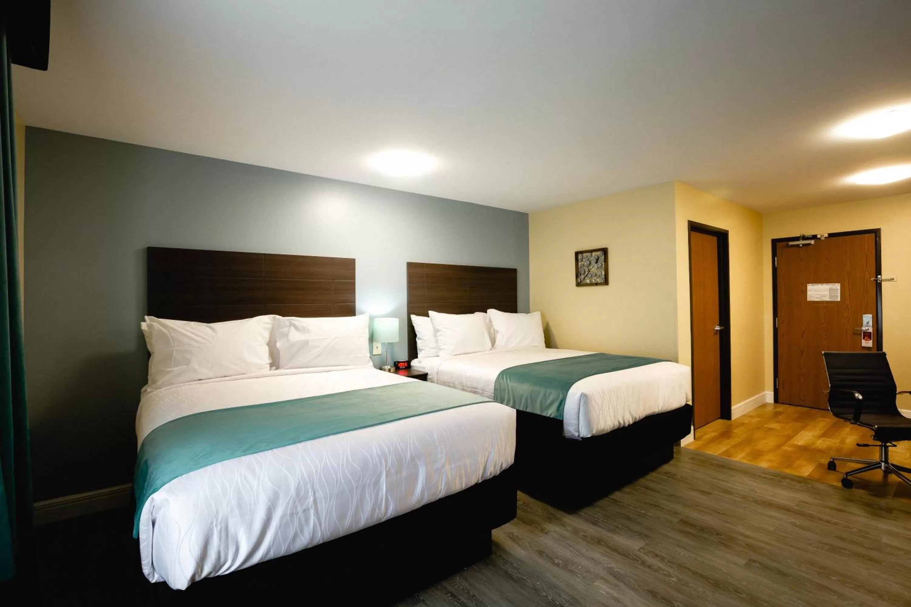 Queen Room with Two Queen Beds - Non-Smoking in Hawthorn Extended Stay by Wyndham Saint Robert