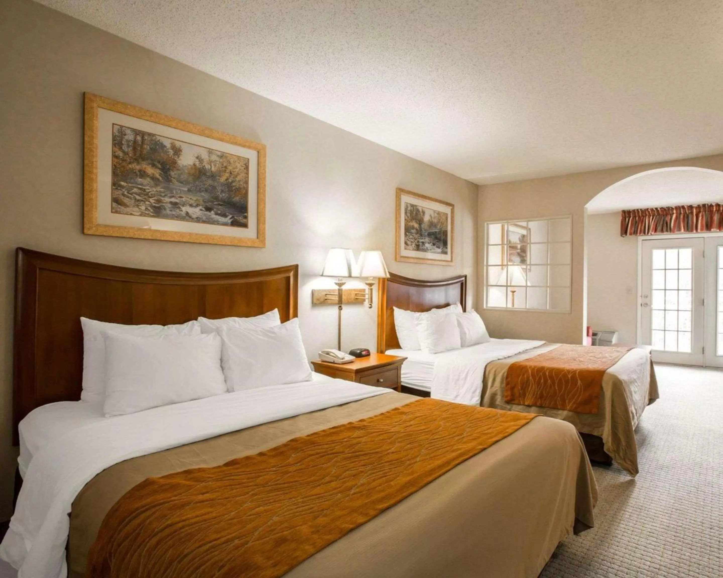 Queen Room with Two Queen Beds - Non-Smoking in Rodeway Inn & Suites Cherokee On the River