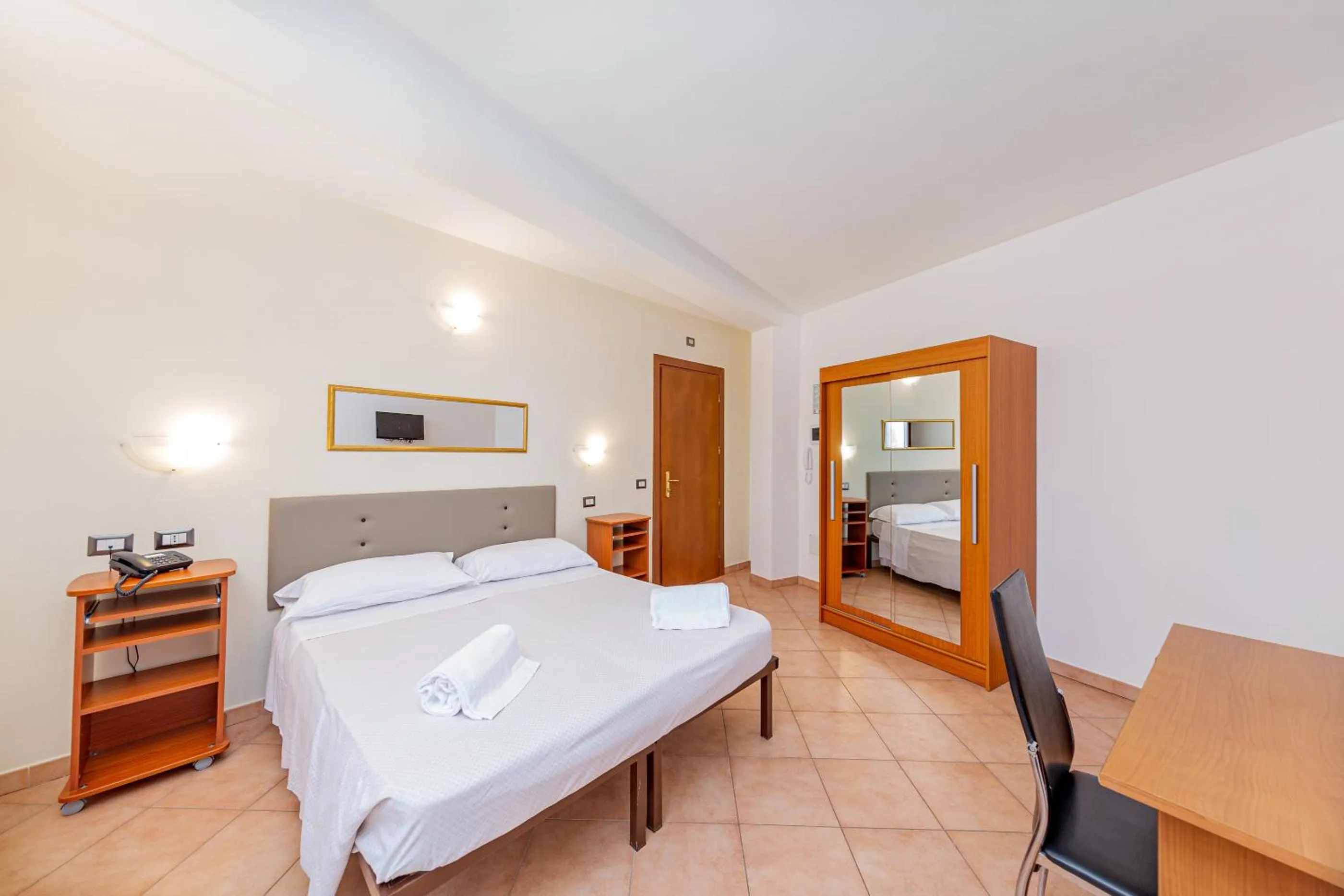 Economy Quadruple Room in Hotel Villa Piras