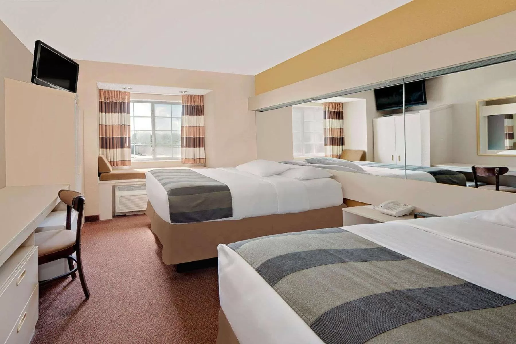 Queen Room with Two Queen Beds - Smoking in Microtel Inn & Suites by Wyndham Joplin