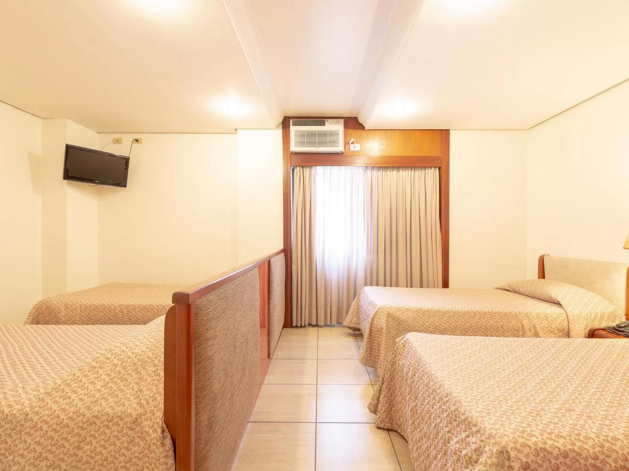 Standard Quadruple Room in Real Castilha Hotel