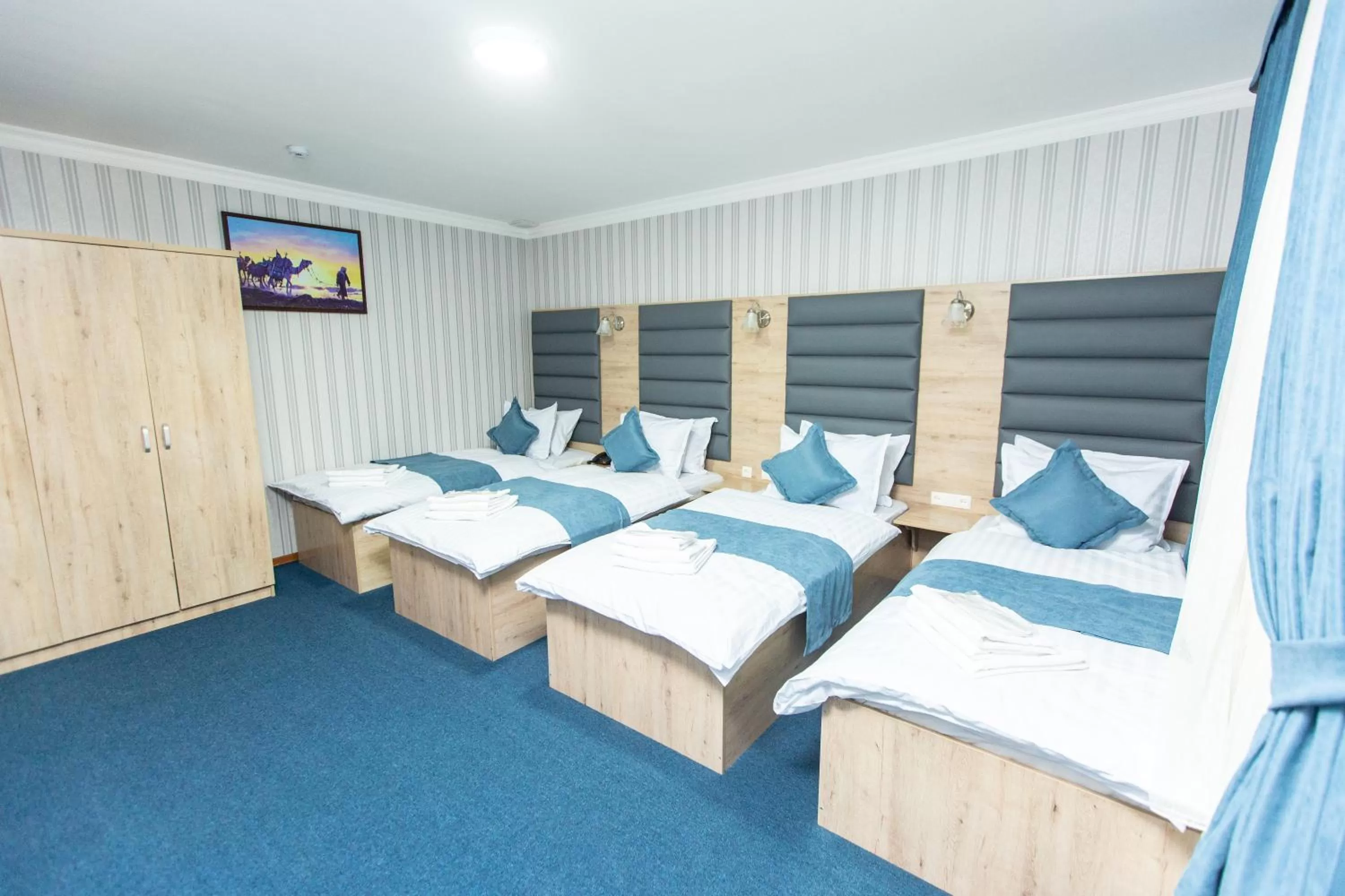 Quadruple Room with Garden View in Mirzo Boutique Hotel