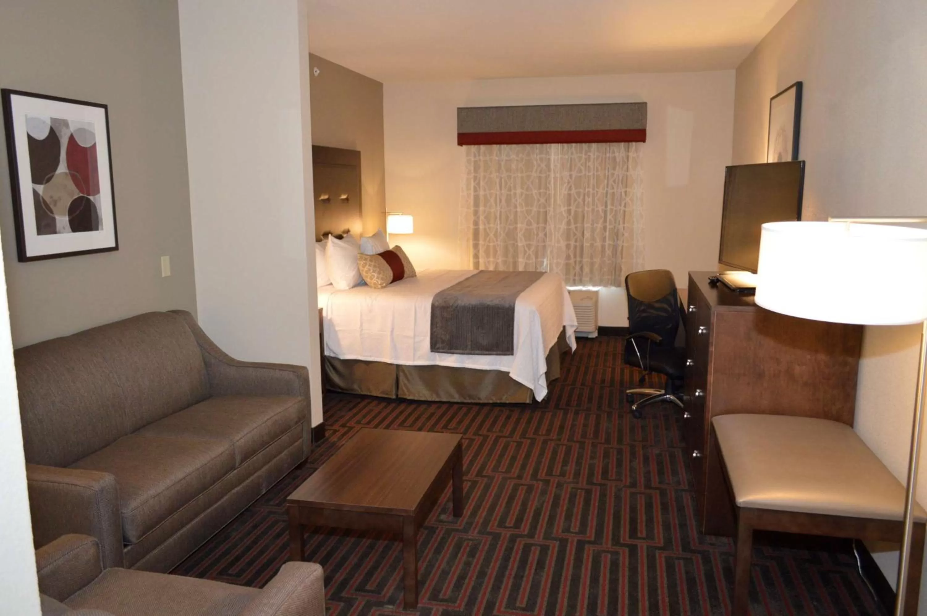 One-Bedroom Executive King Suite with Wet Bar and Sofa Bed - Non-Smoking in Best Western Plus Stevens County Inn