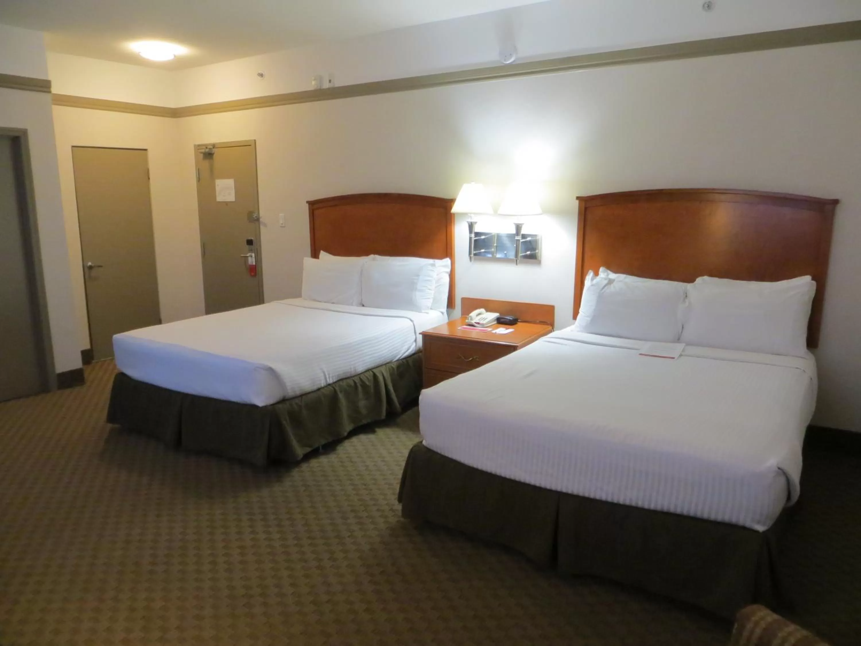 Queen Room with Two Queen Beds - Pet Friendly in Ramada by Wyndham Edmonton South