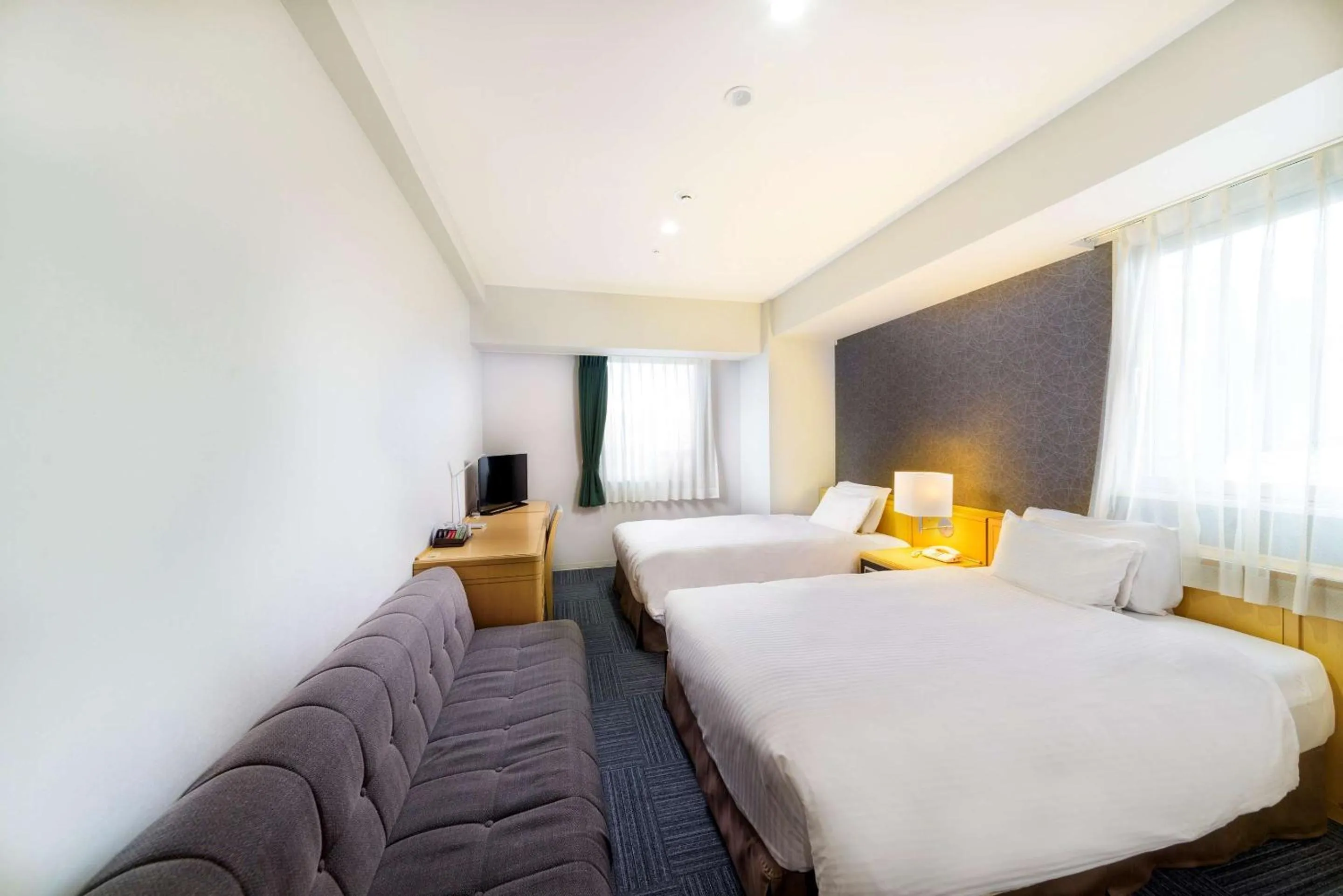Deluxe Twin Room with Sofa Bed - Smoking in SureStay Plus Hotel by Best Western Shin-Osaka