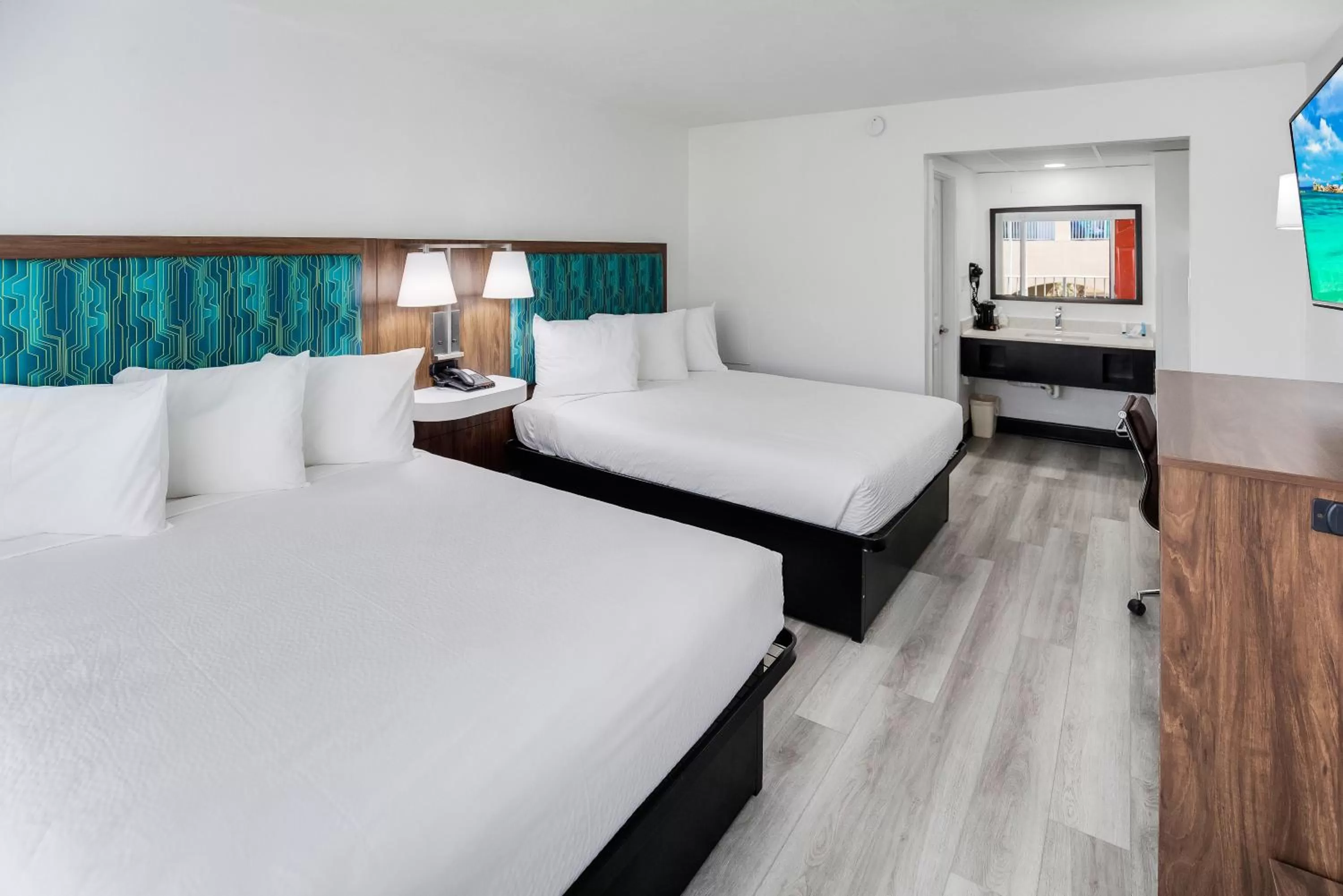 Queen Room with Two Queen Beds - Non-Smoking with Ocean View in Blu Atlantic Hotel & Suites