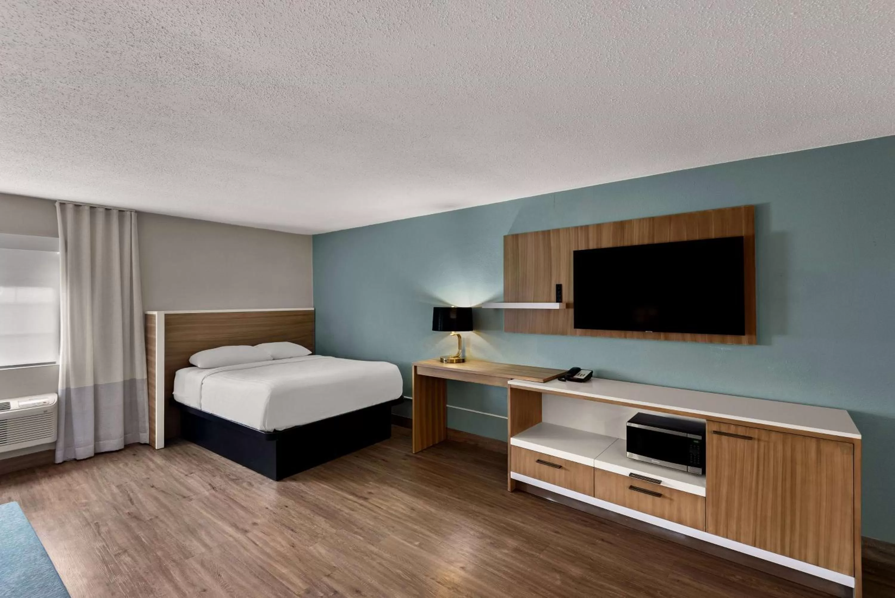 Family Suite with Three Queen Beds - Non-Smoking in Wyndham Garden Ankeny