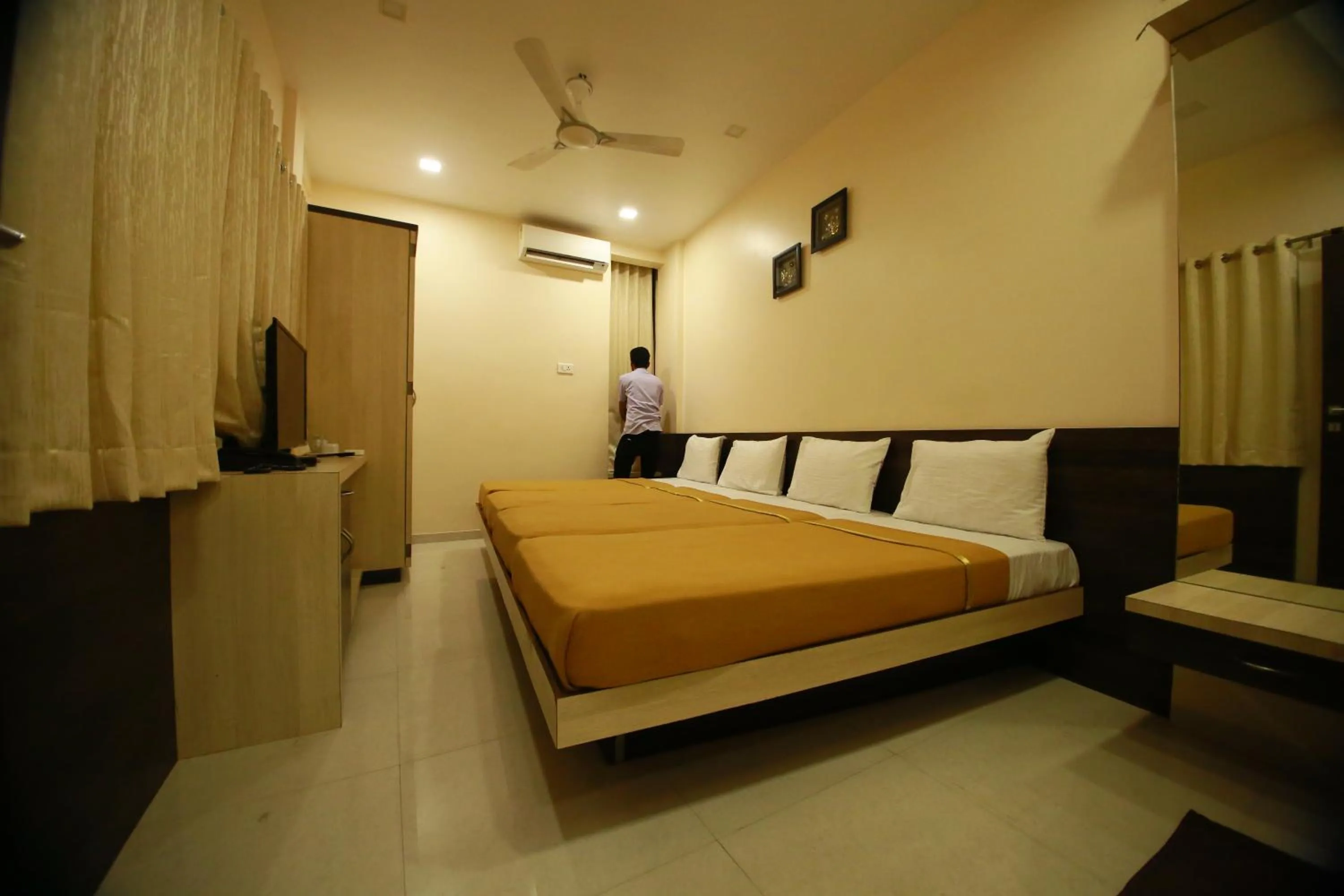 Standard Quadruple Room Non AC in Hotel Madhuri Executive