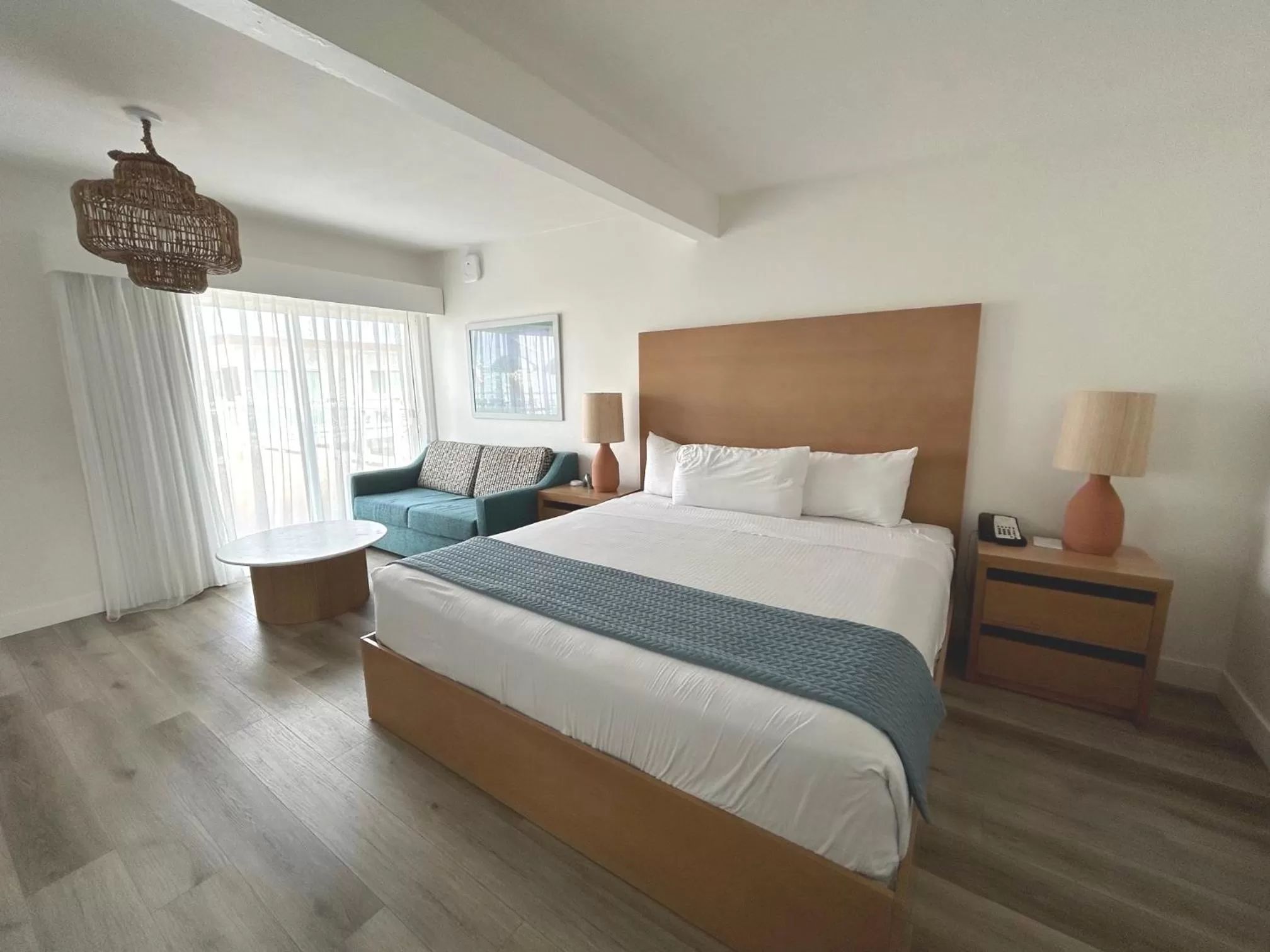 King Room with Sofa Bed - Deck View in Capri Laguna on the Beach - A Boutique Hotel