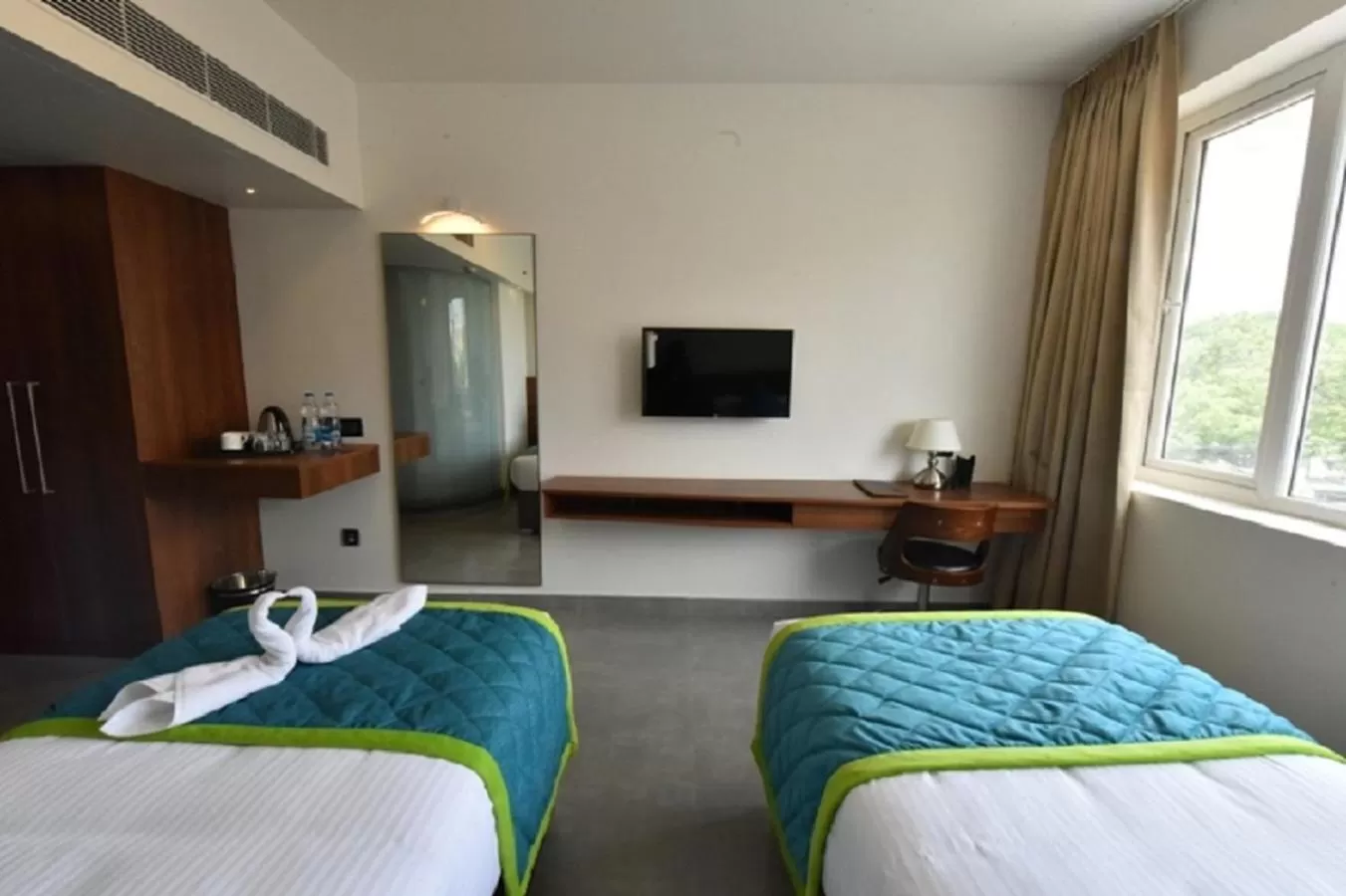 Classic Twin Room (Enjoy 10% off on Evening Cocktails  Early Check-In upto 2 hours (subject to availability) Early Check-In upto 2 hours (subject to availability)   in Vivid A Boutique Hotel