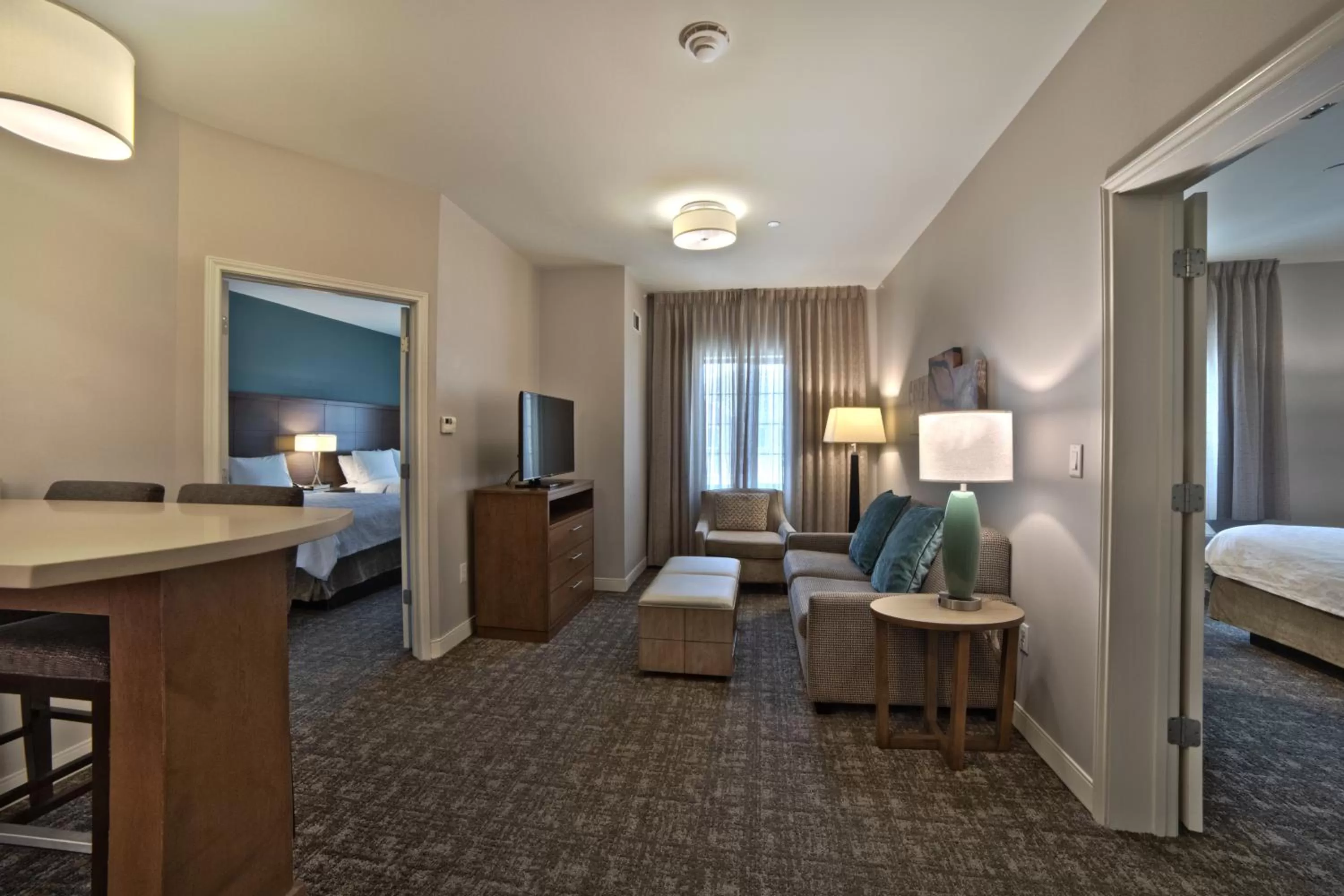 Two-Bedroom Suite with One King and Two Queen Beds in Staybridge Suites Houston - Humble Beltway 8 E by IHG