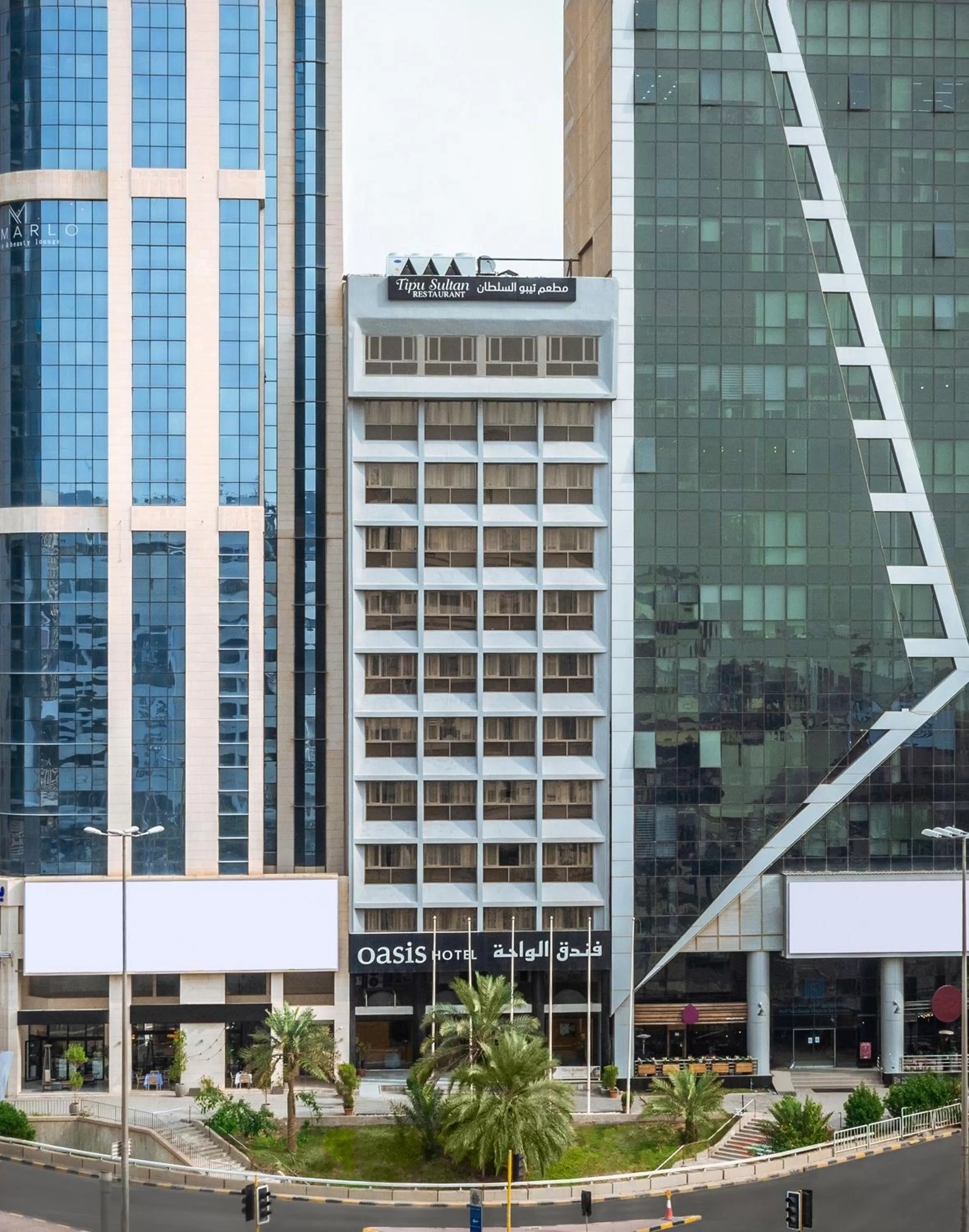 Facade/entrance in Oasis Hotel