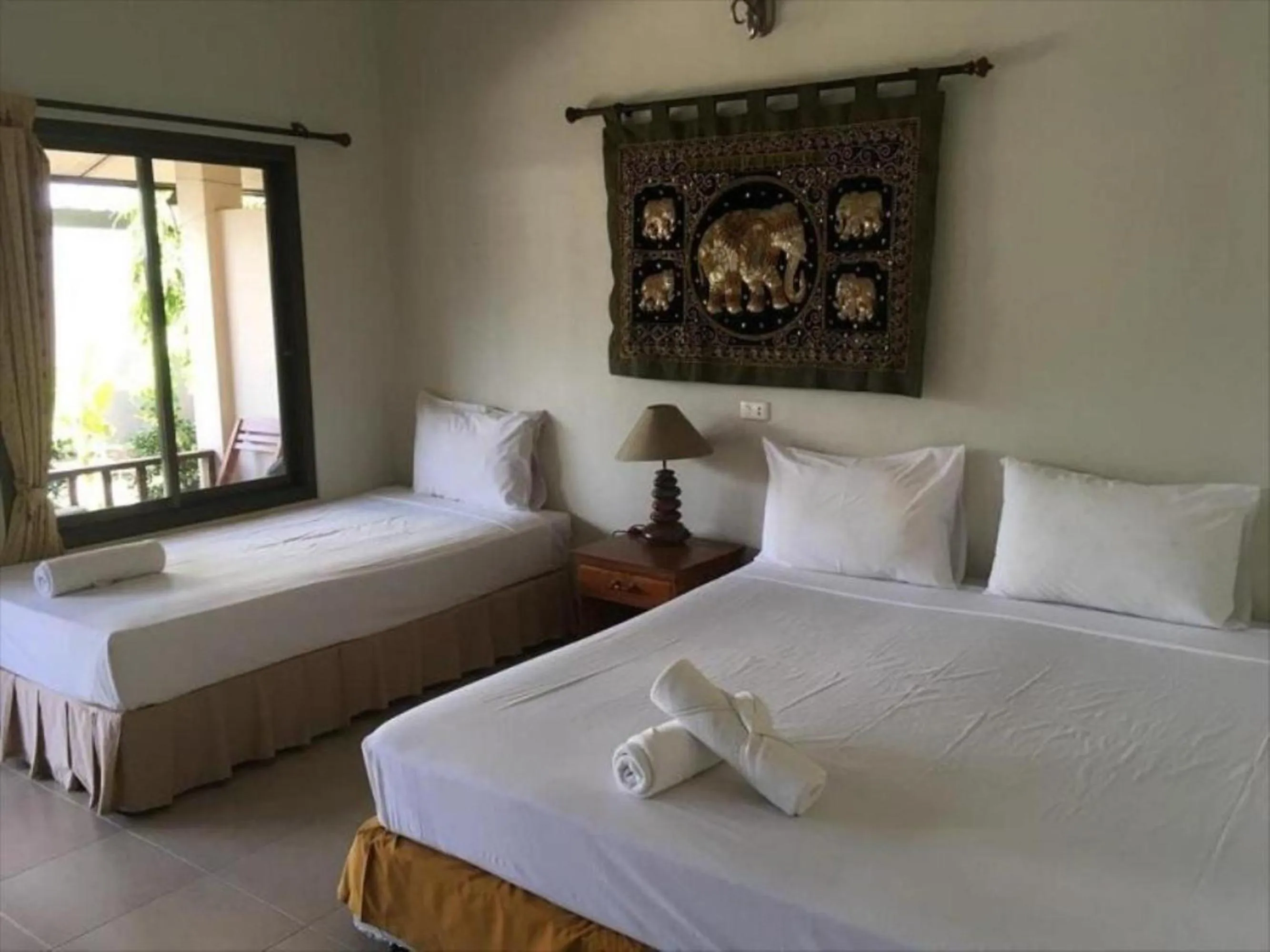 Fan Triple Room in Magic Resort