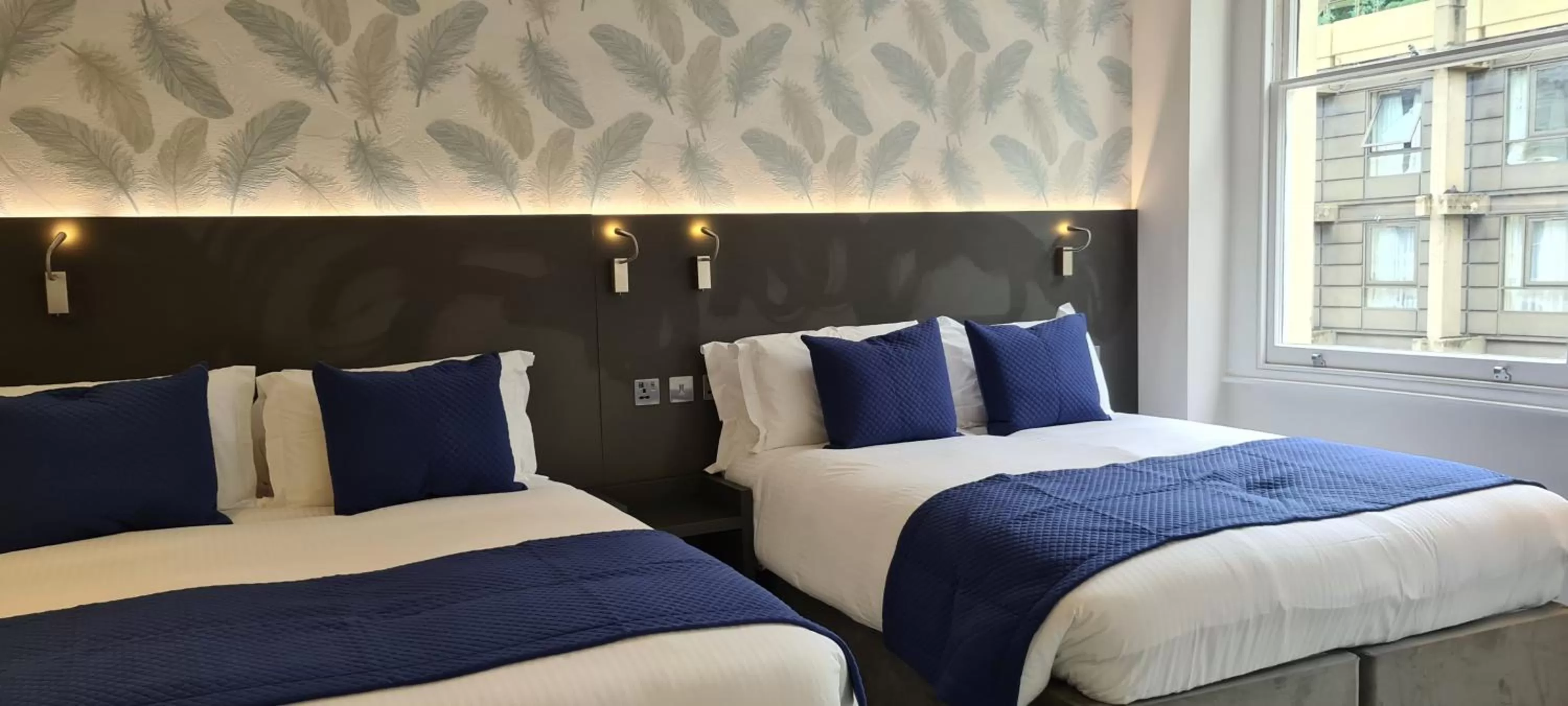 Deluxe Family Room in Commodore Hotel