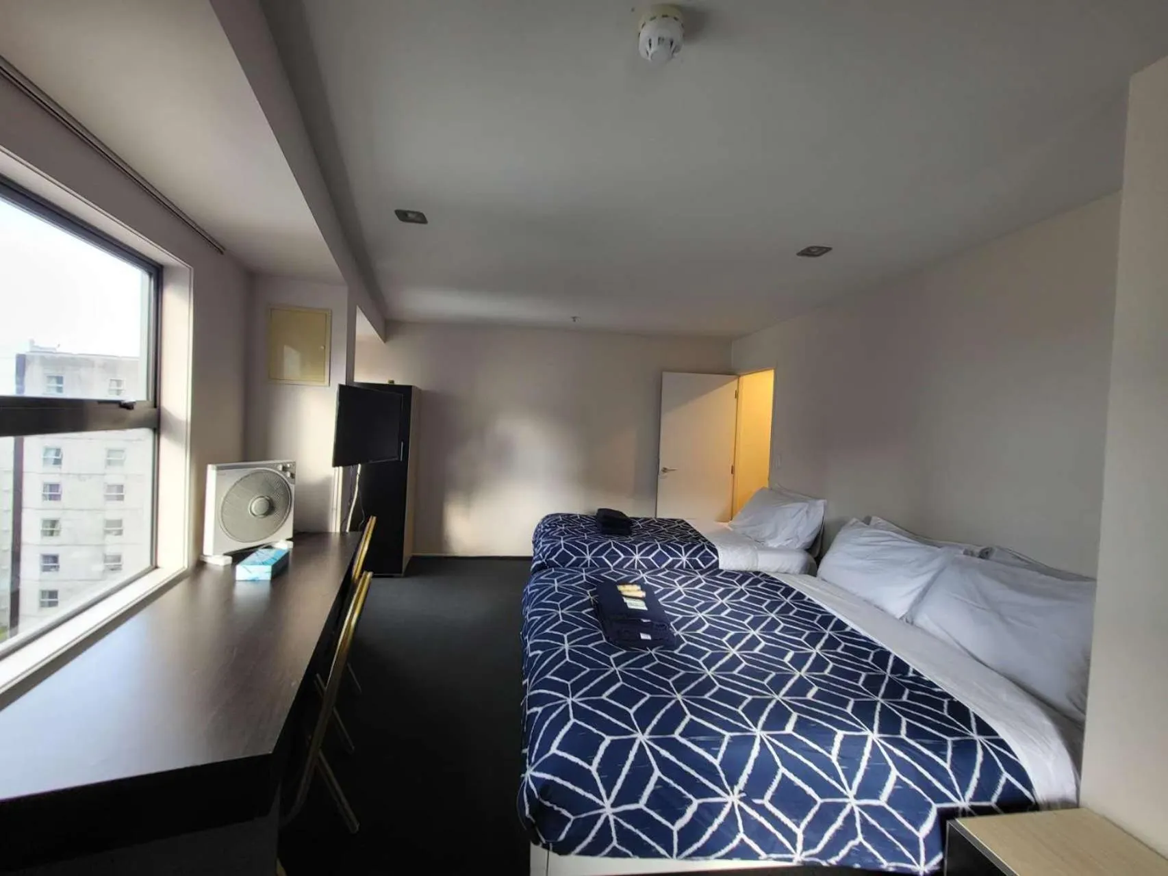 Studio Apartment with Two Single Beds in Empire Apartments