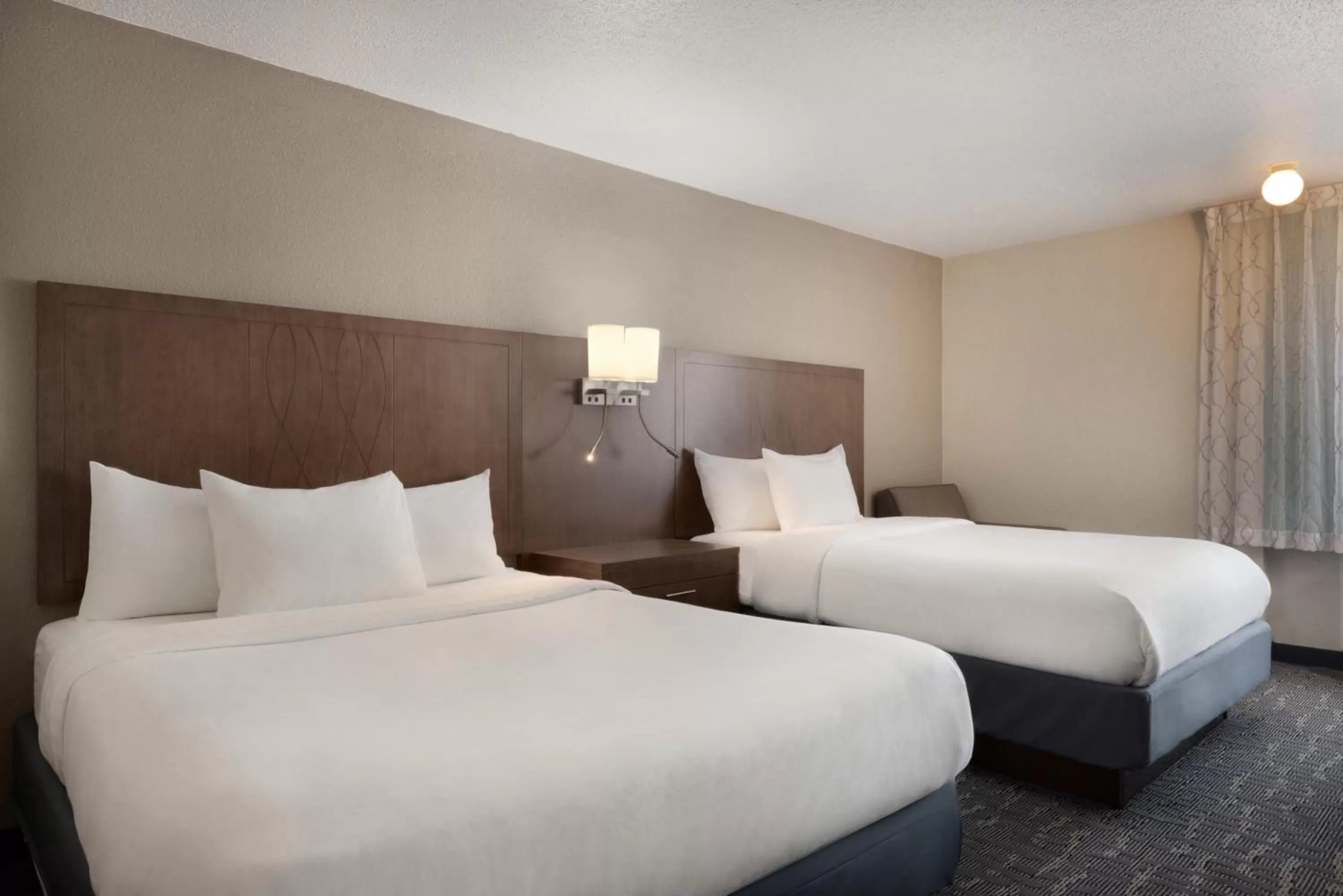 Queen Room with Two Queen Beds - Non-Smoking in Baymont by Wyndham Des Moines North