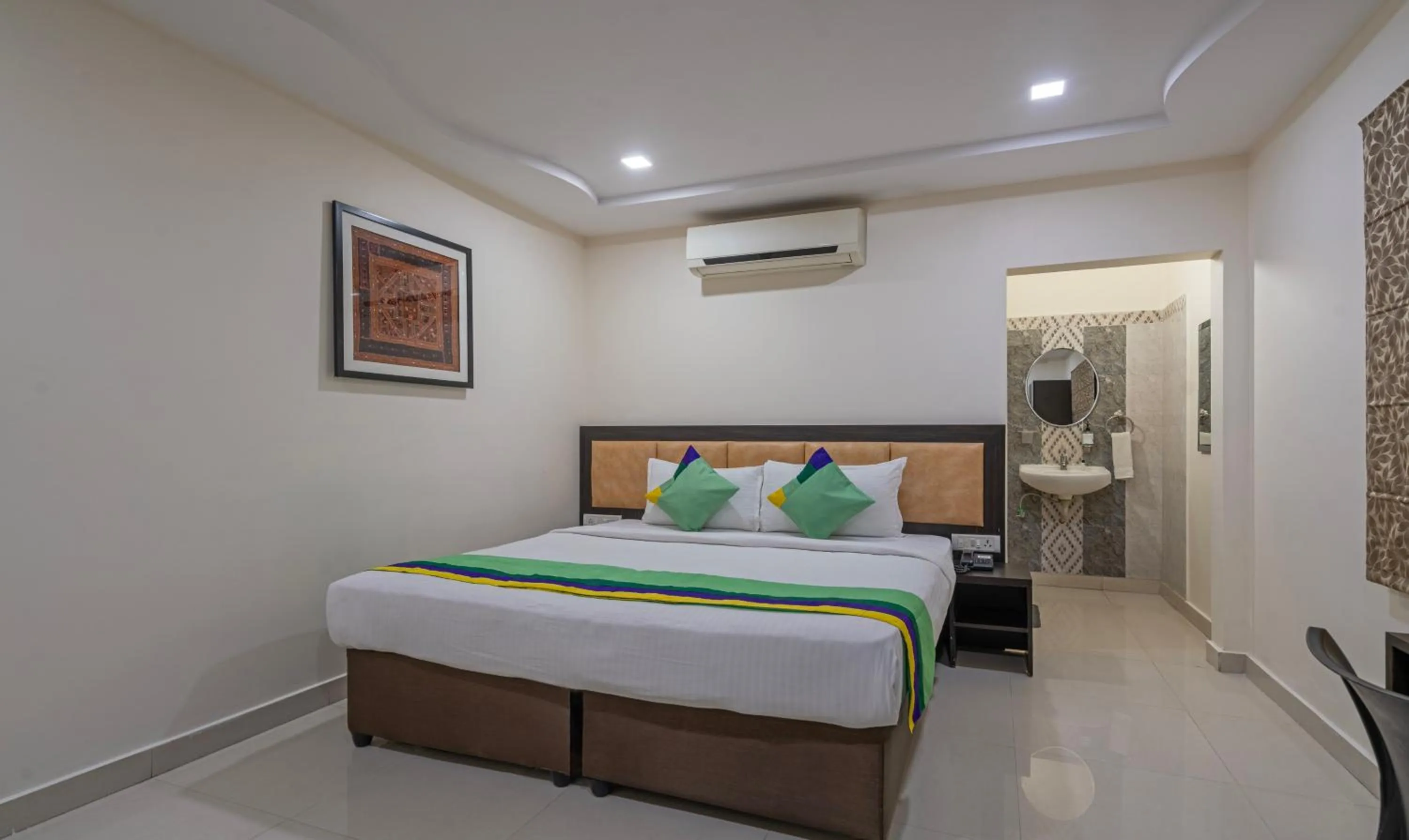 Deluxe Room - single occupancy in Treebo Emerald