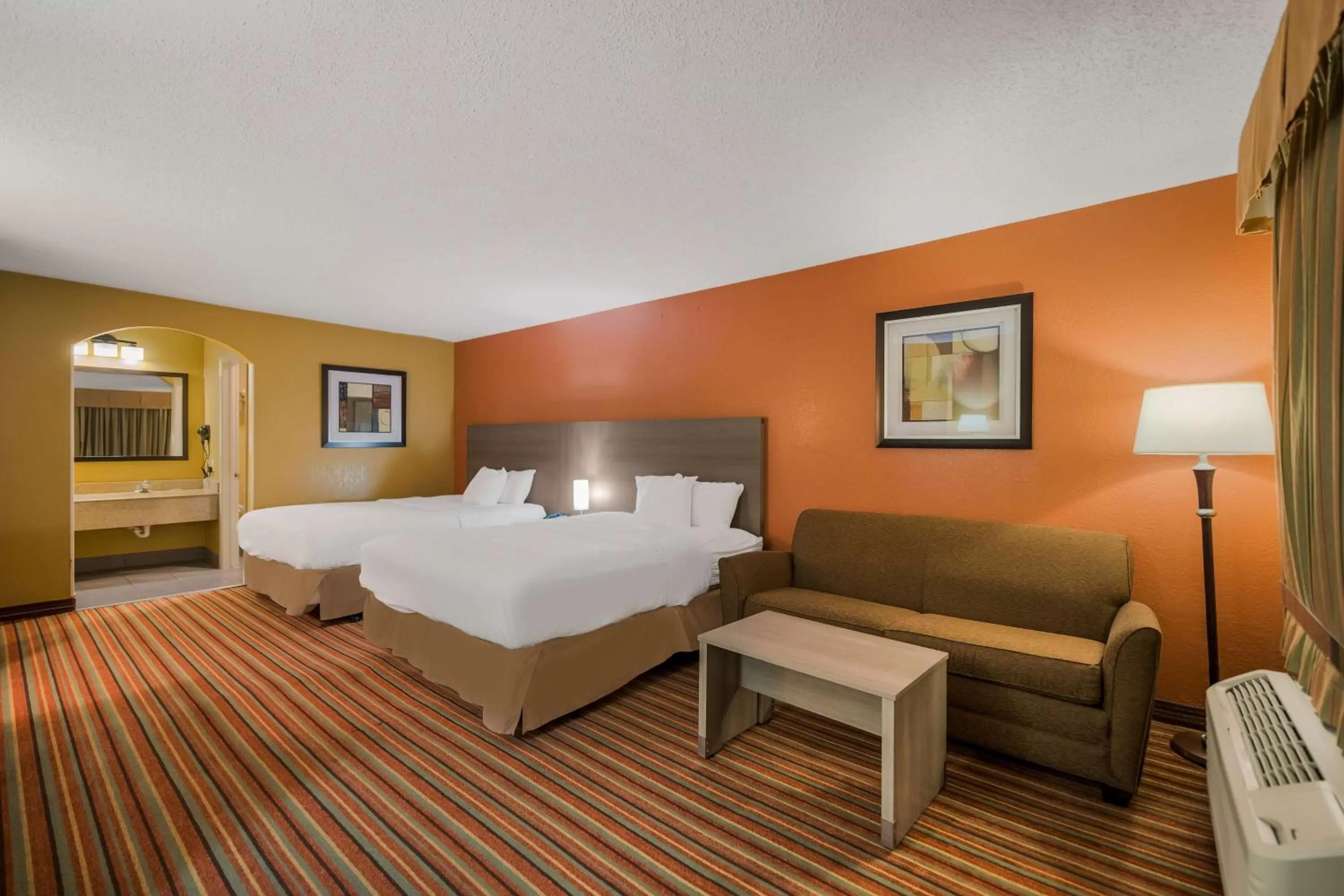 Queen Room with Two Queen Beds and Sofa Bed - Non-Smoking in SureStay Hotel by Best Western Mt Pleasant