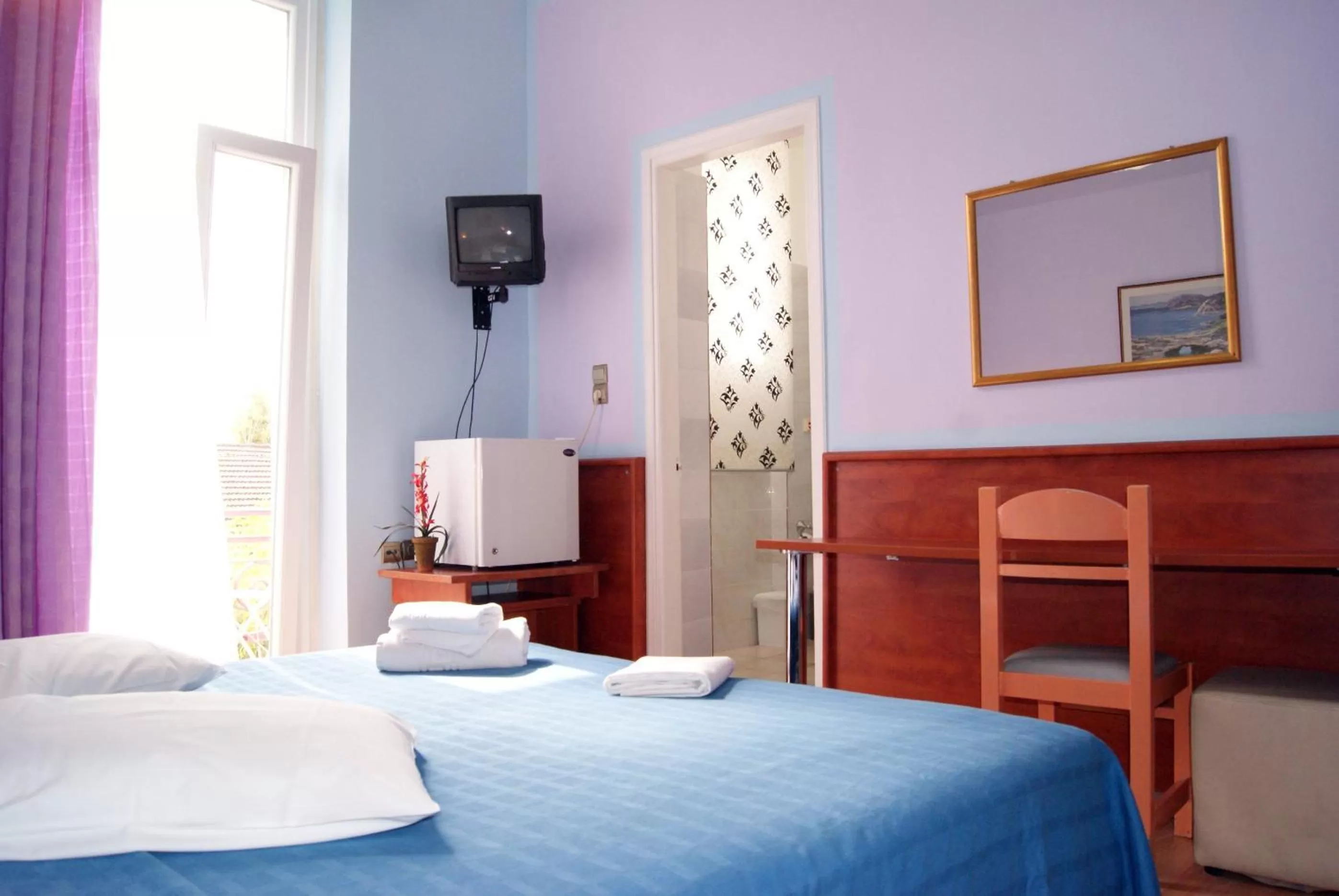 Bed in Diethnes Hotel