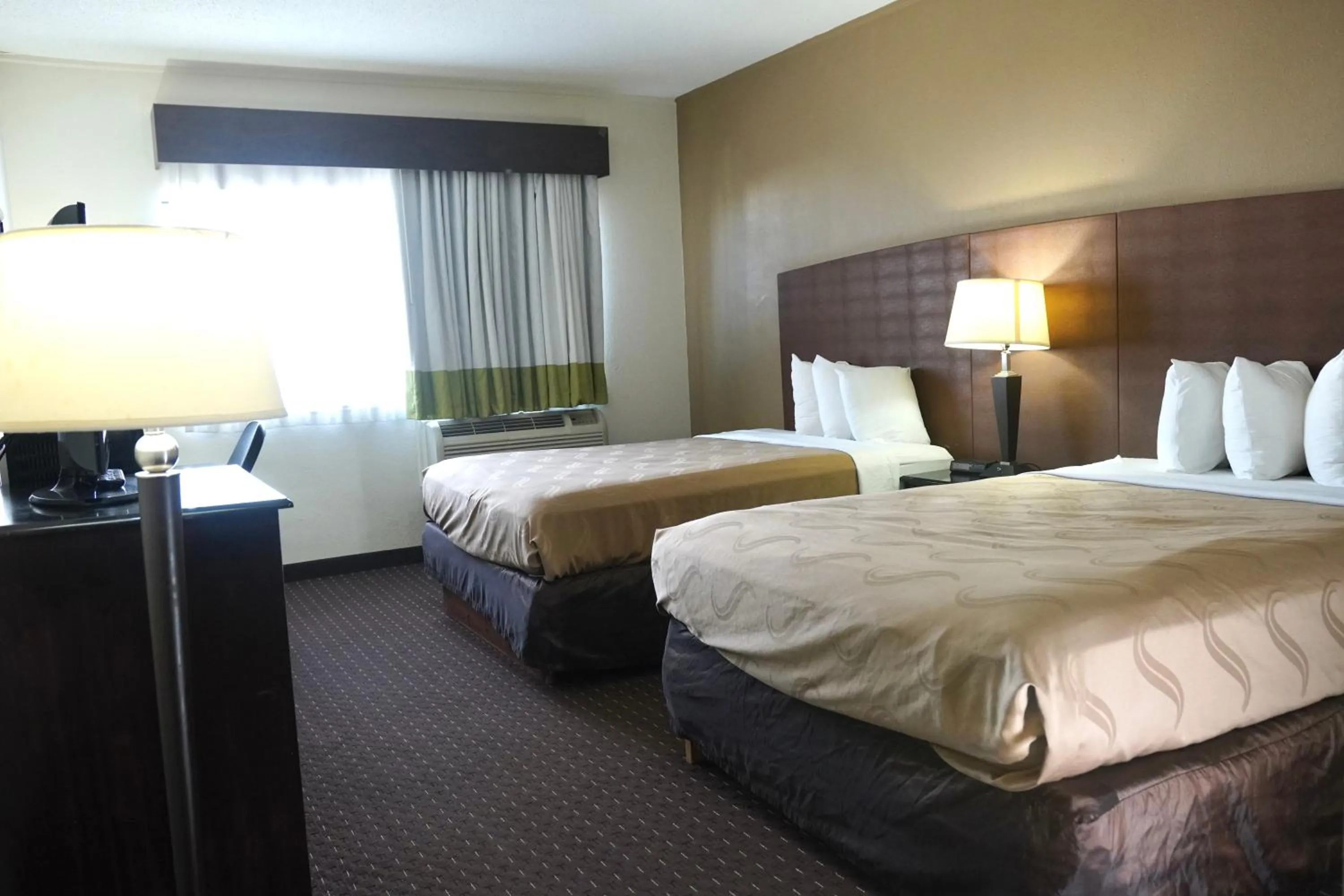 Queen Room with Two Queen Beds - Disability Access in American Inn & Suites