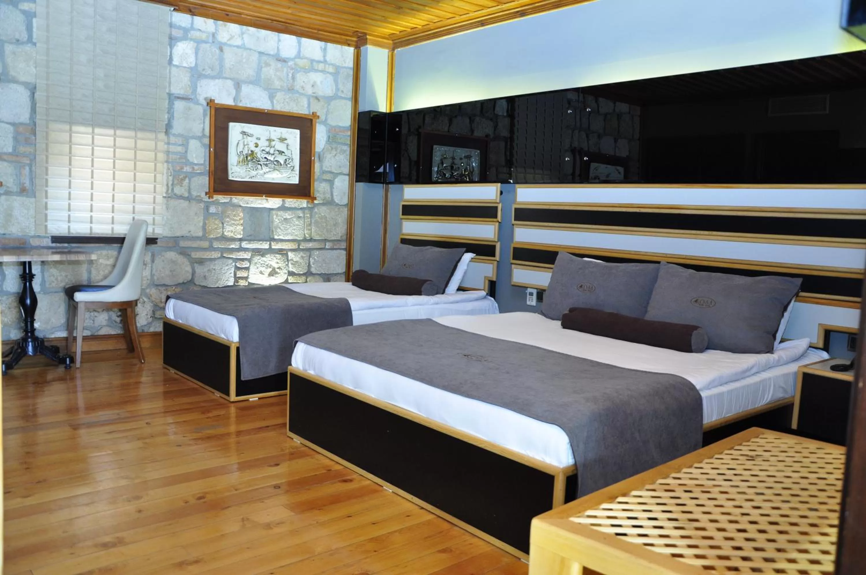Deluxe Triple Room in Kosa boutique hotel