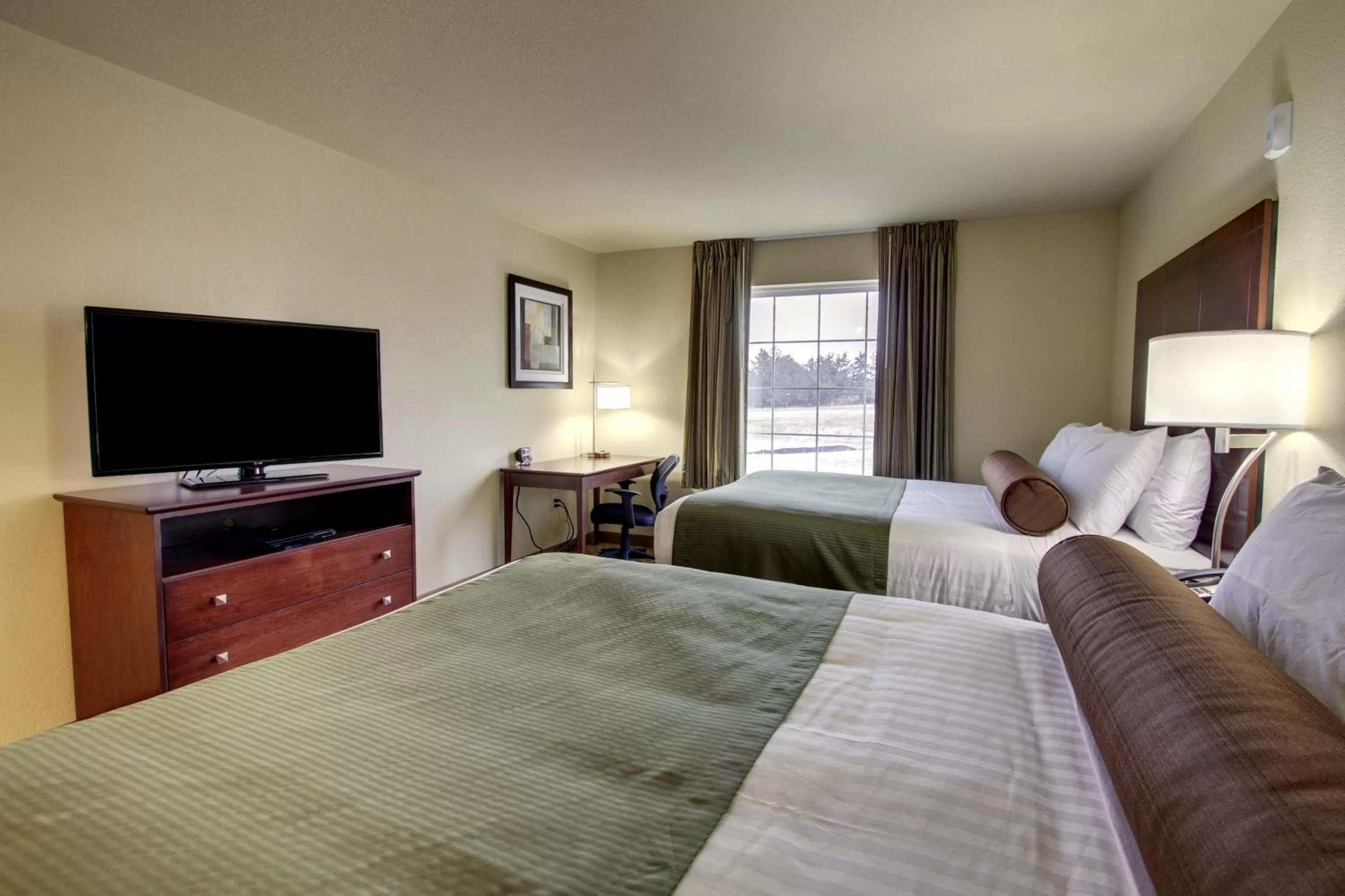 Photo of the whole room, Bed in Cobblestone Inn & Suites-Winterset