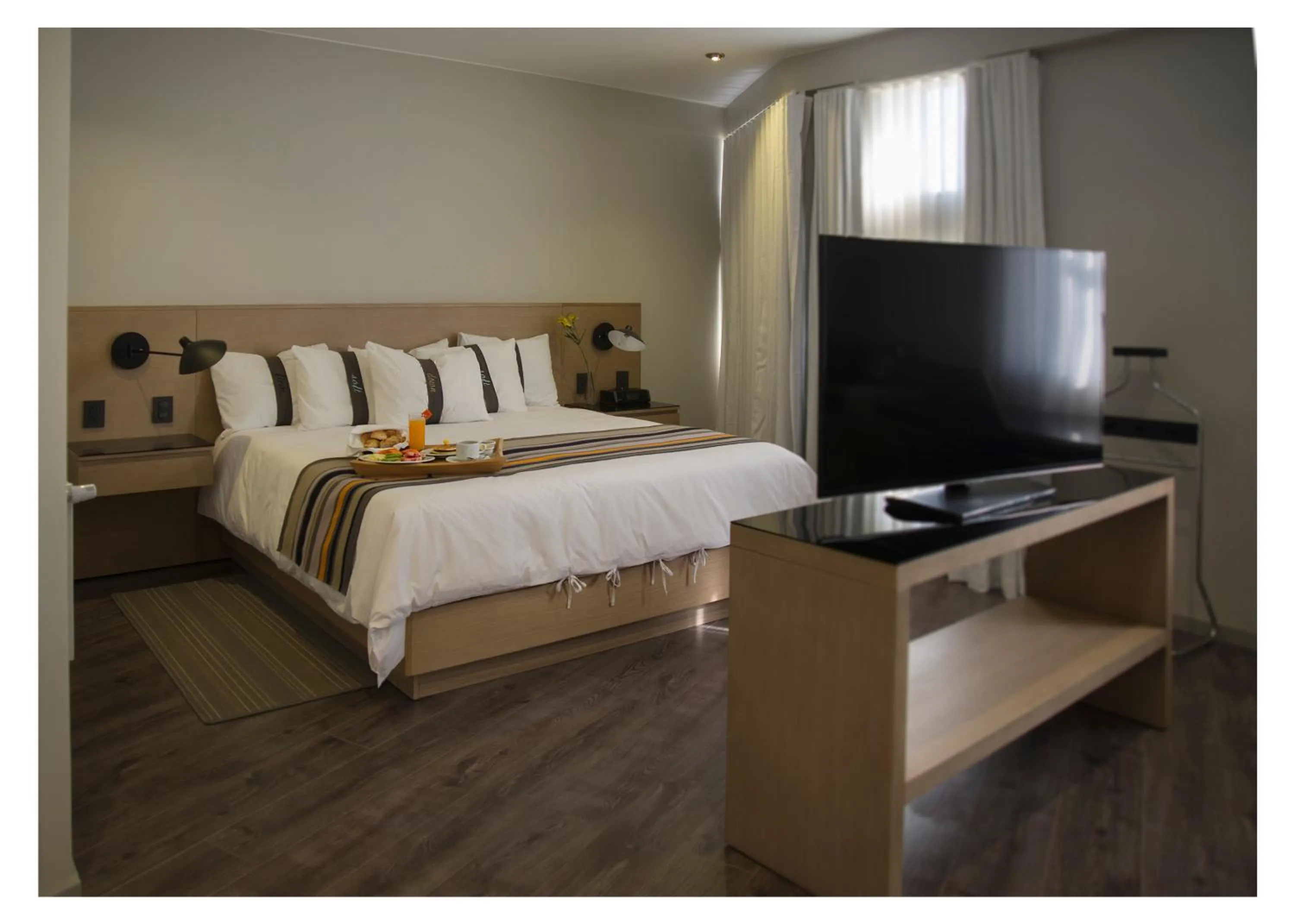 Luxury Quadruple Room in Casa Grande Suites