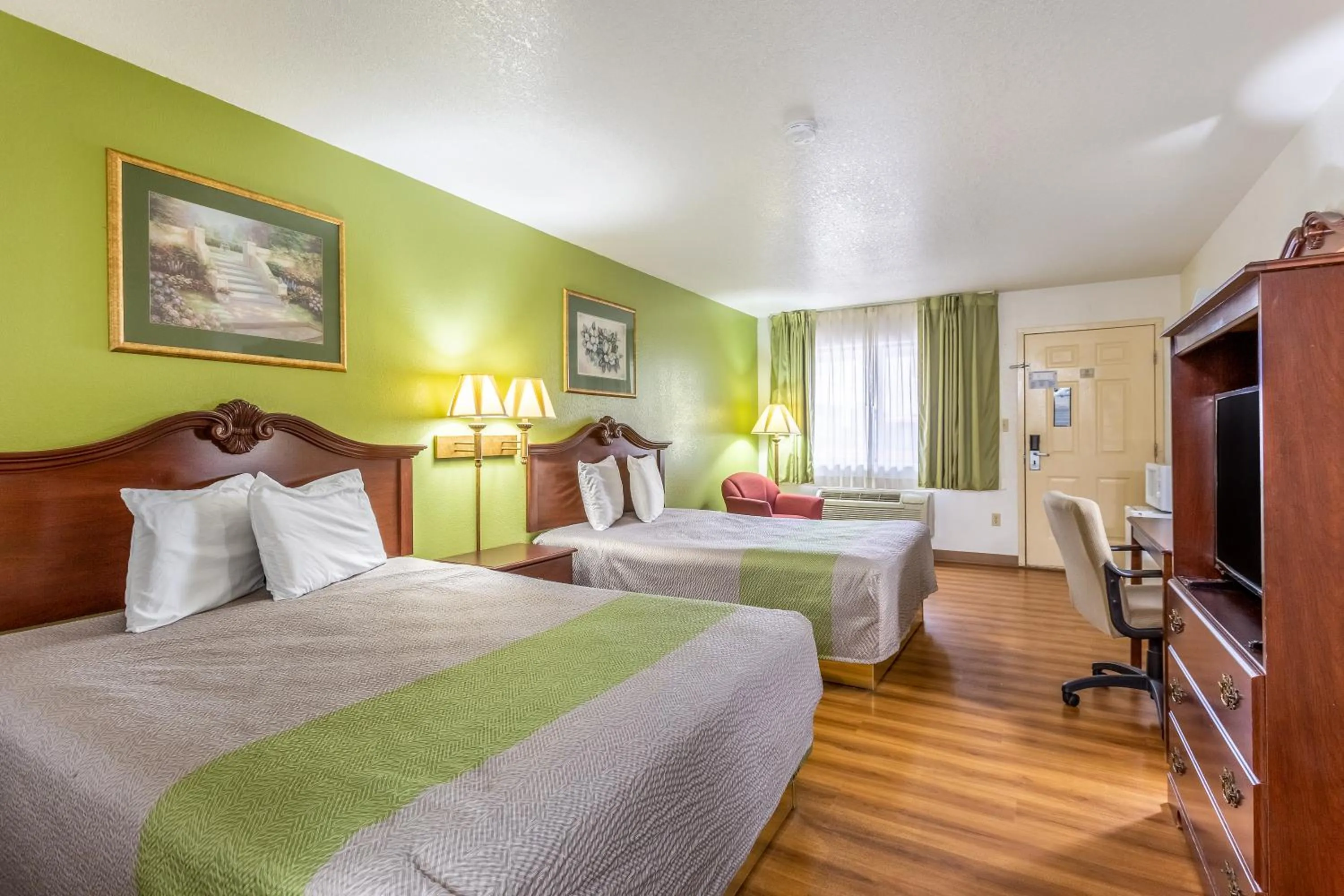 Standard Queen Room with Two Queen Beds and Sofa Bed - Non-Smoking in Rodeway Inn