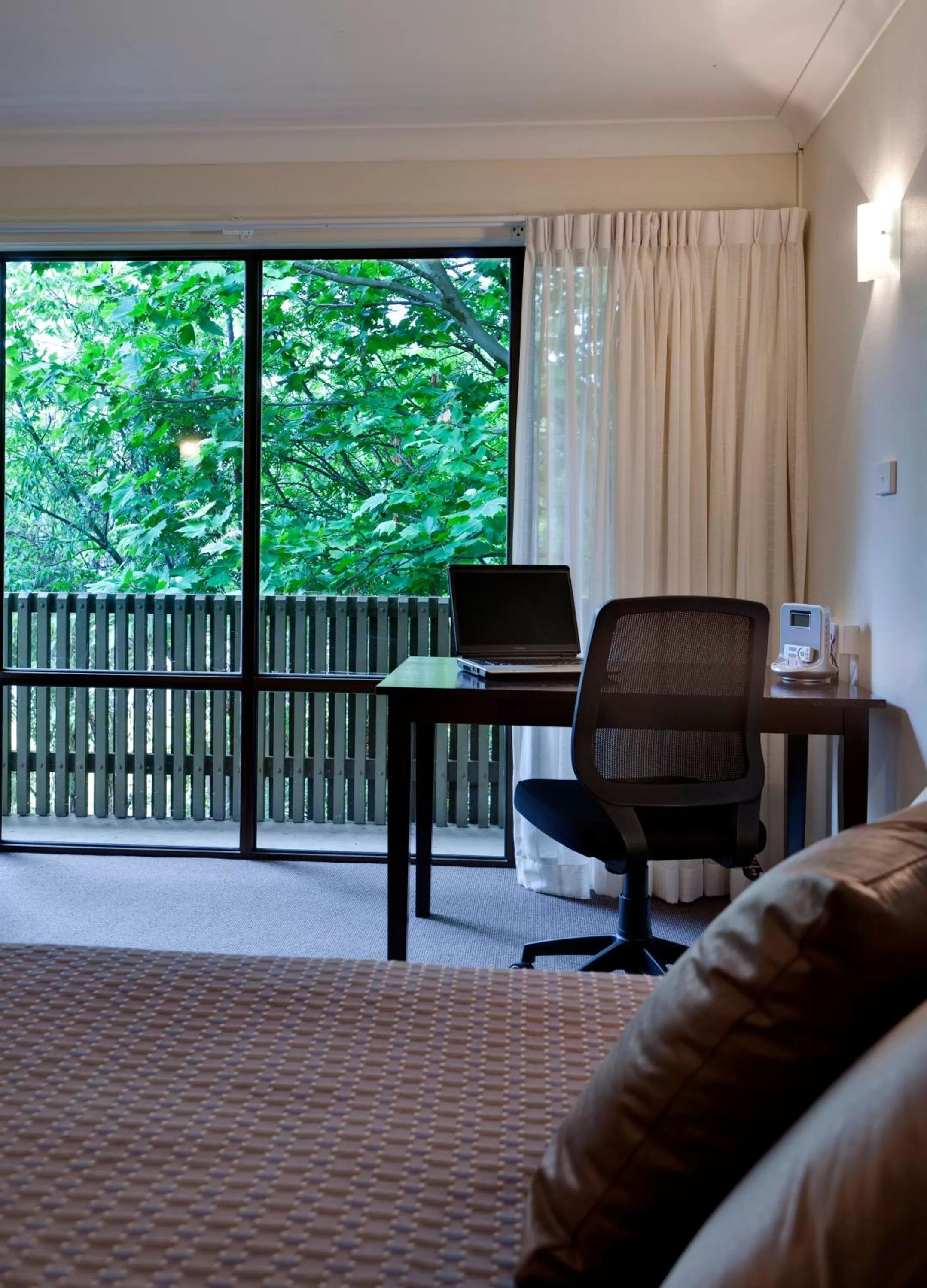 Executive Queen Room with Balcony in ibis Styles Canberra Tall Trees