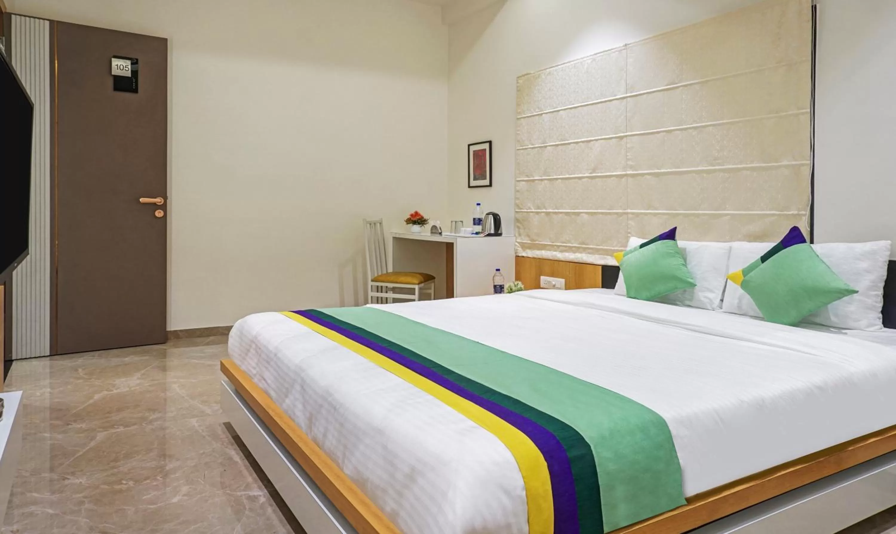 Deluxe Double Room in Treebo The Utsav, Nashik