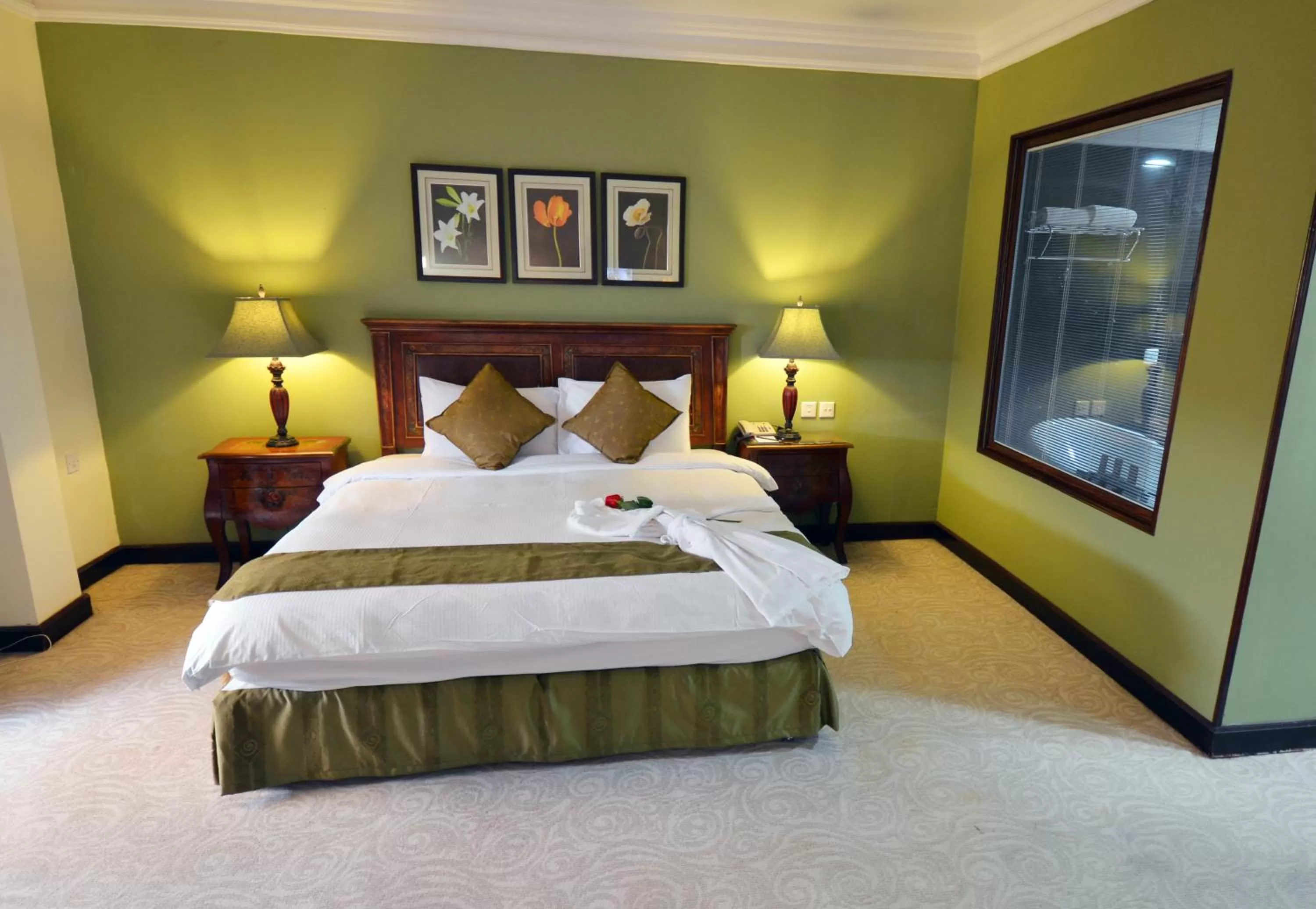 Deluxe Room in The Convention Center & Royal Suites Hotel