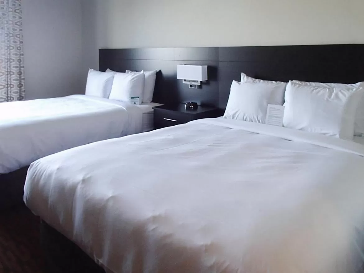 Queen Room with Two Queen Beds in Suburban Studios Midland I-20