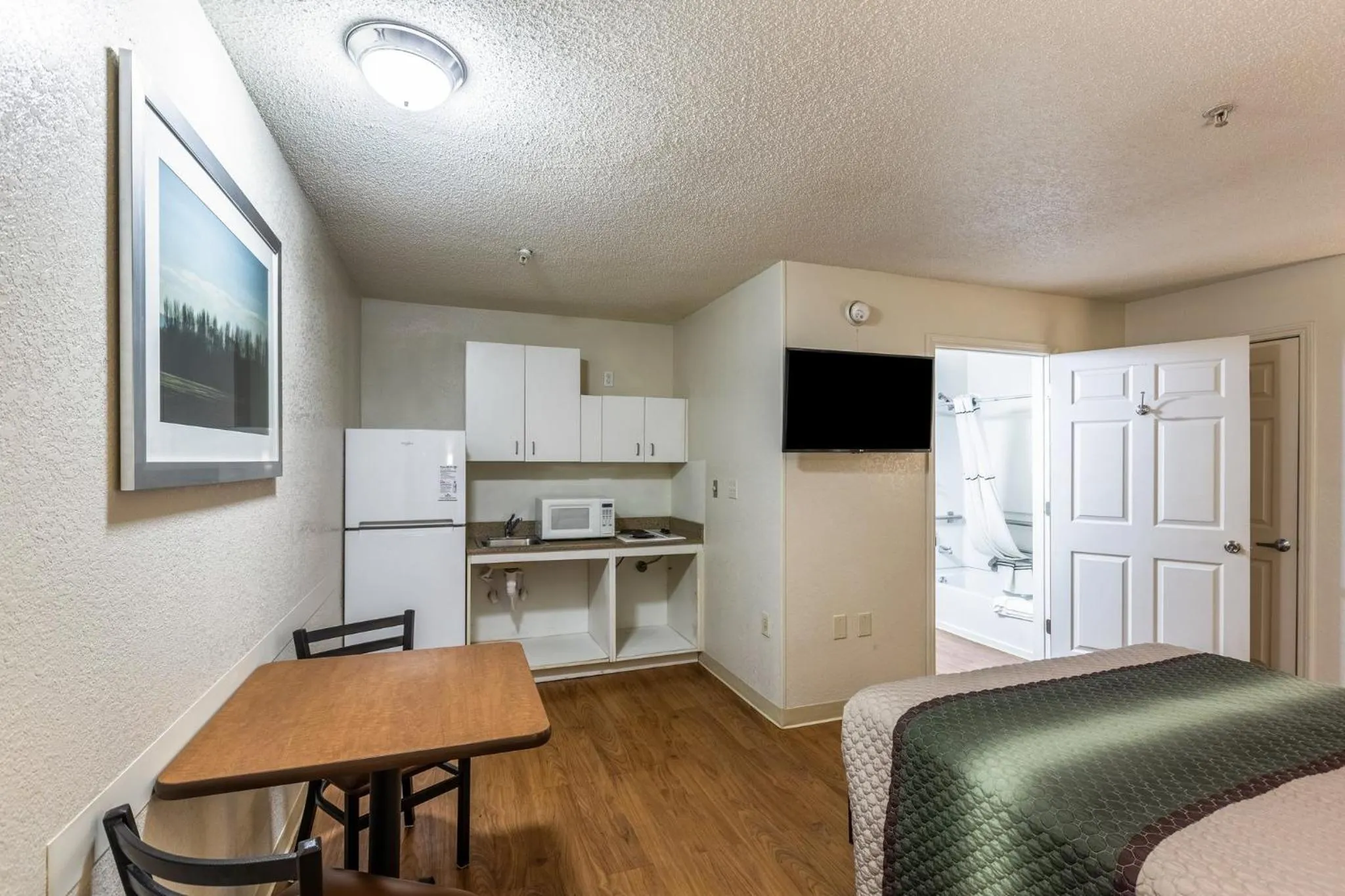 Studio Room with Two Double Beds Smoking in HomeTowne Studios by Red Roof Gainesville, GA