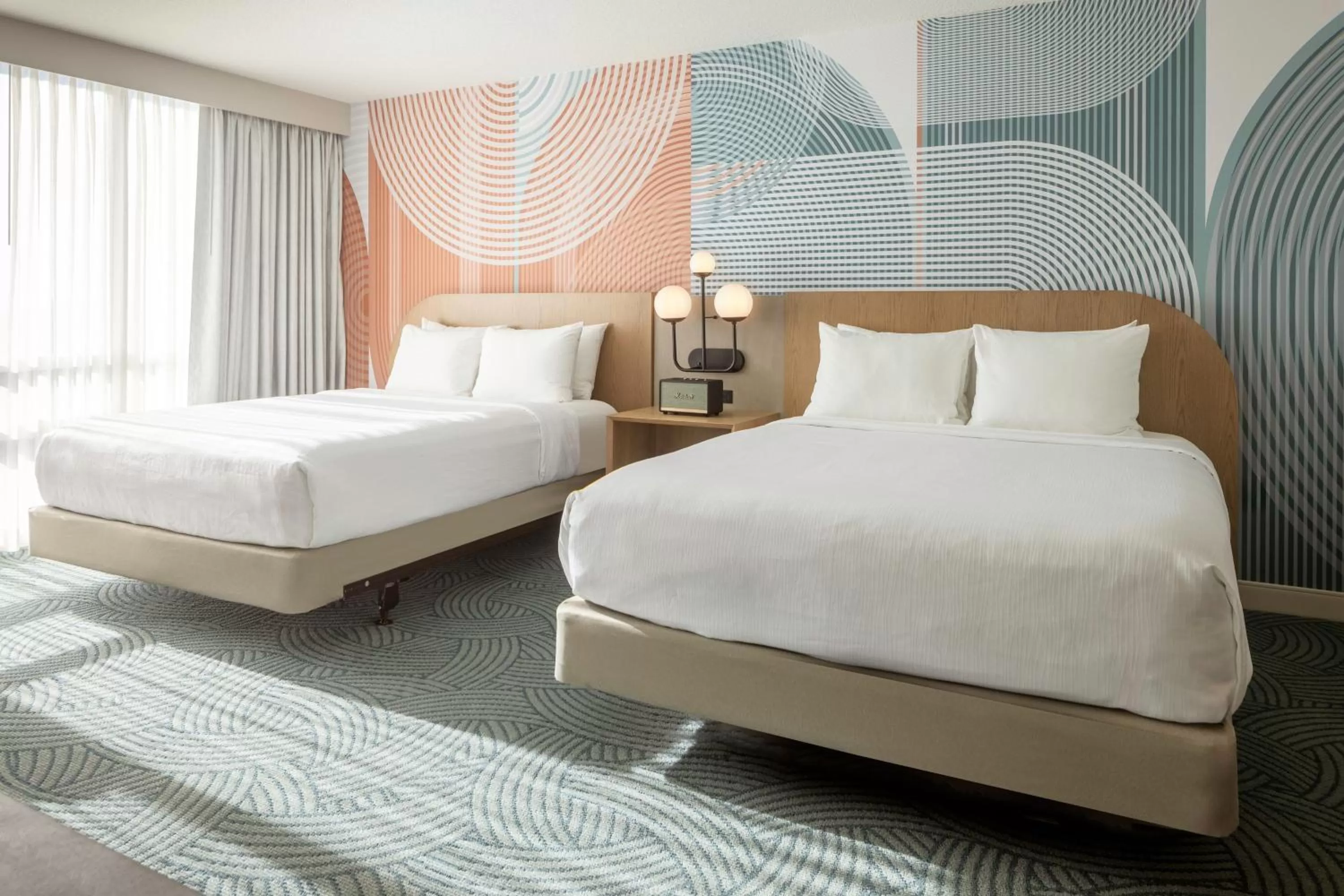 Queen Room with Two Queen Beds and Adapted Tub - Mobility Accessible in Hotel Kinetic Orlando Universal Blvd