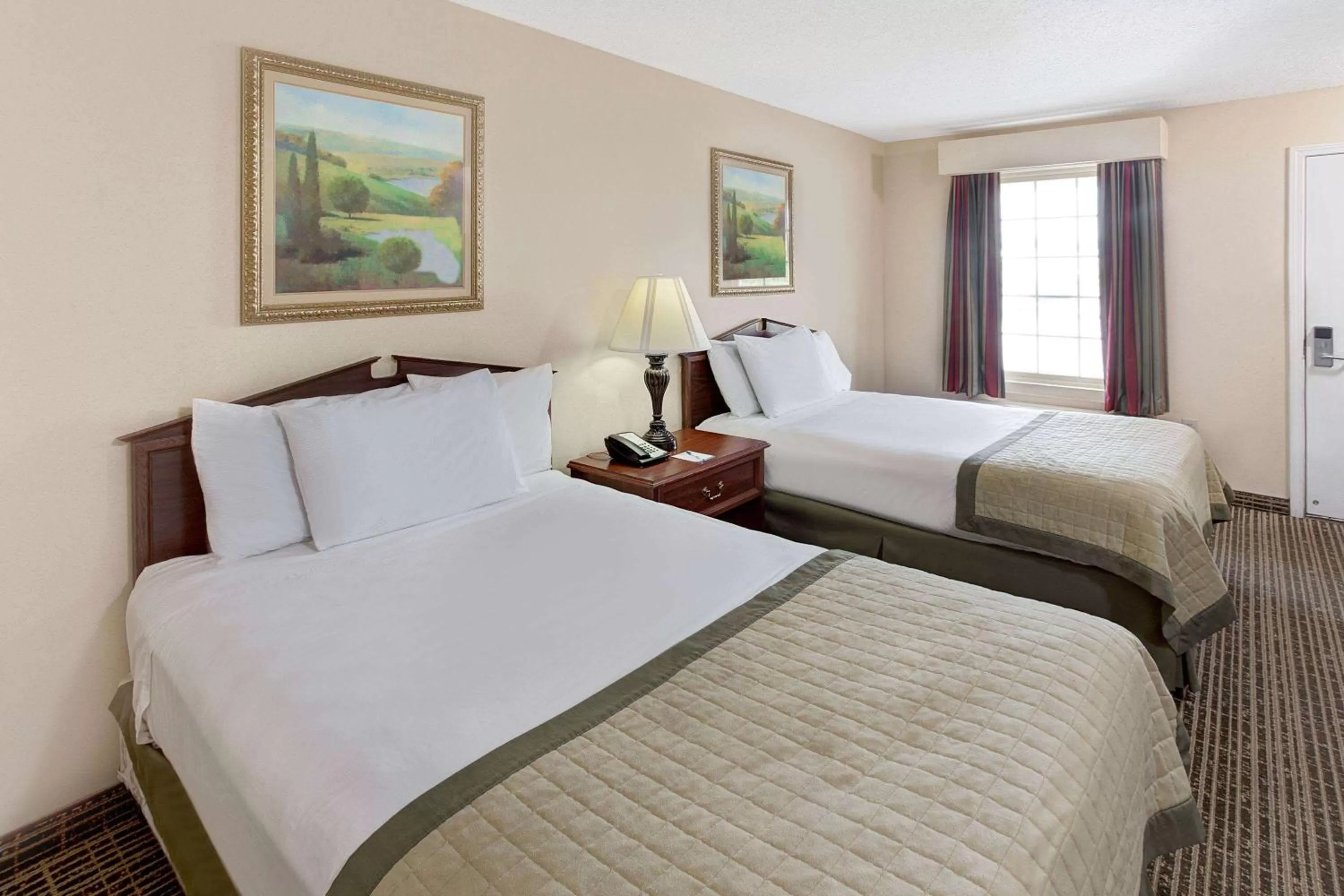 Deluxe Double Room with Two Double Beds - Non-Smoking in Baymont by Wyndham Sanford