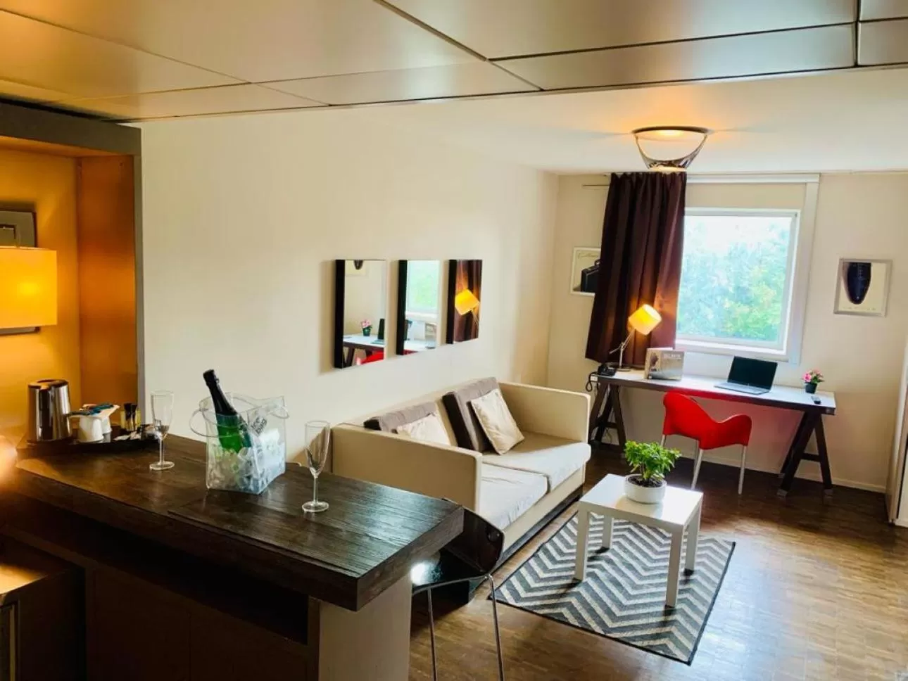 Junior Suite with Free Shuttle to CDG Airport in Standing Hotel Suites by Actisource