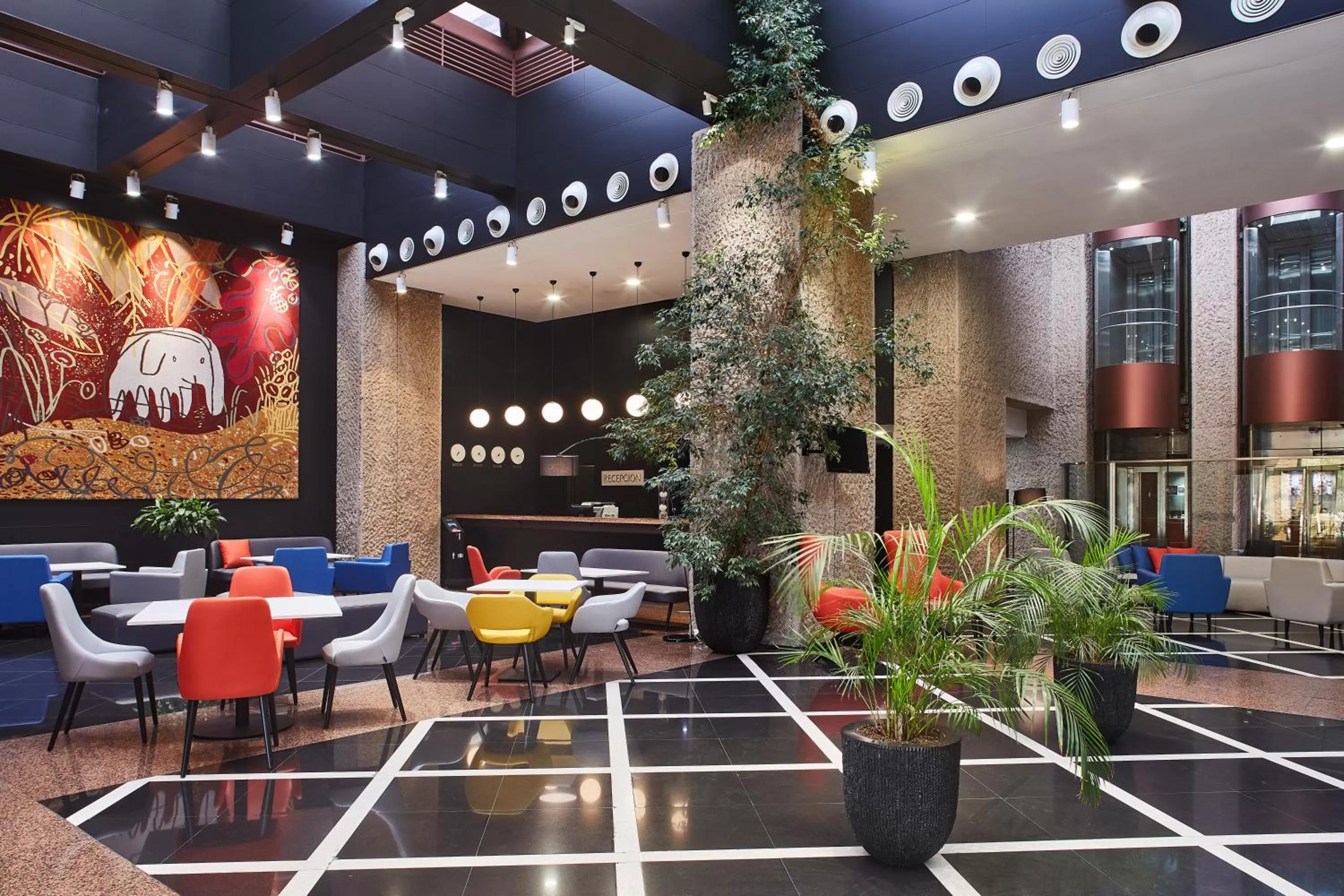 Lobby or reception in Silken Puerta Madrid