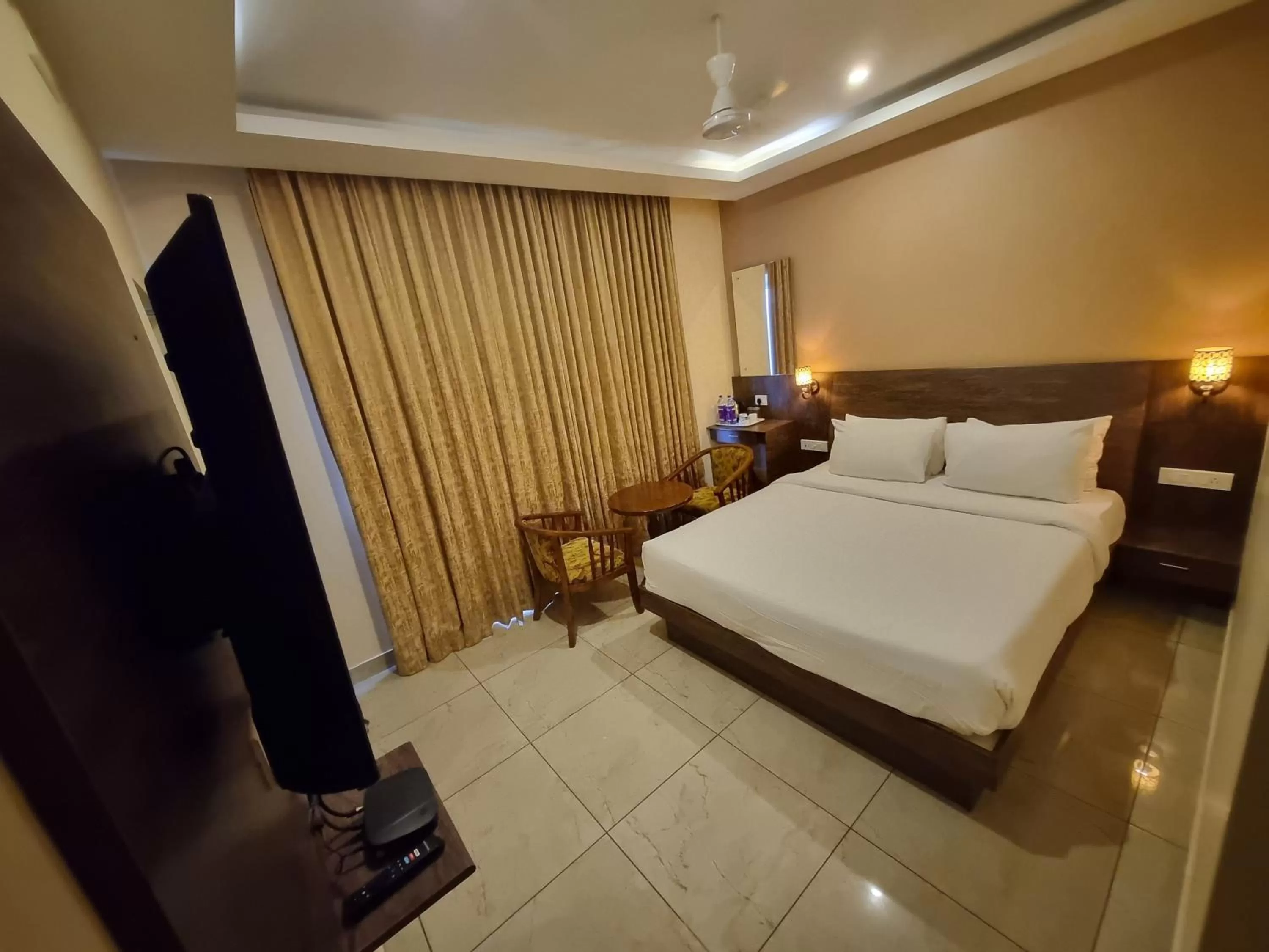 Deluxe Room in PLUTUS RESIDENCY