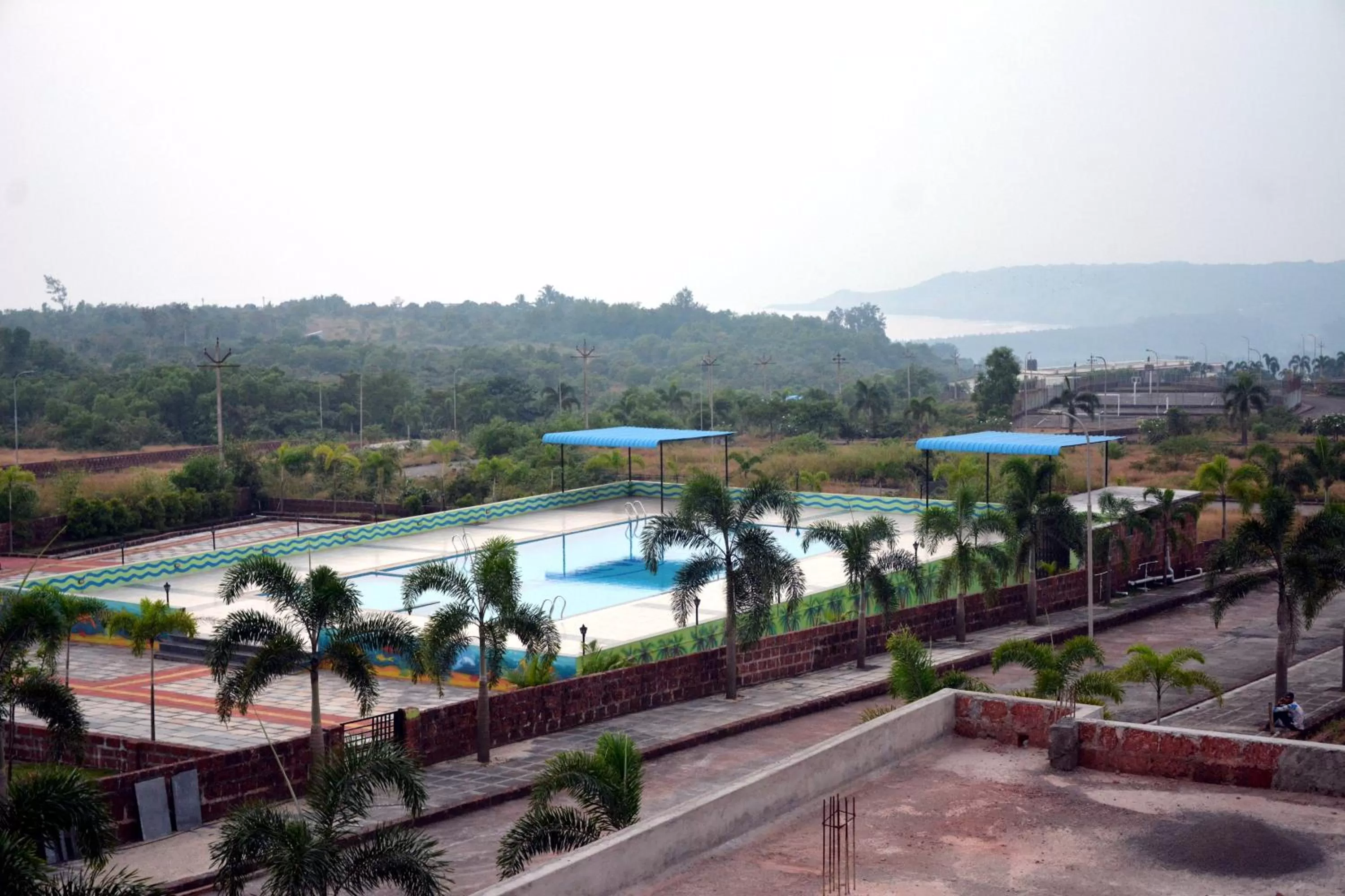 Swimming pool in Mango Valley Resort Ganpatipule