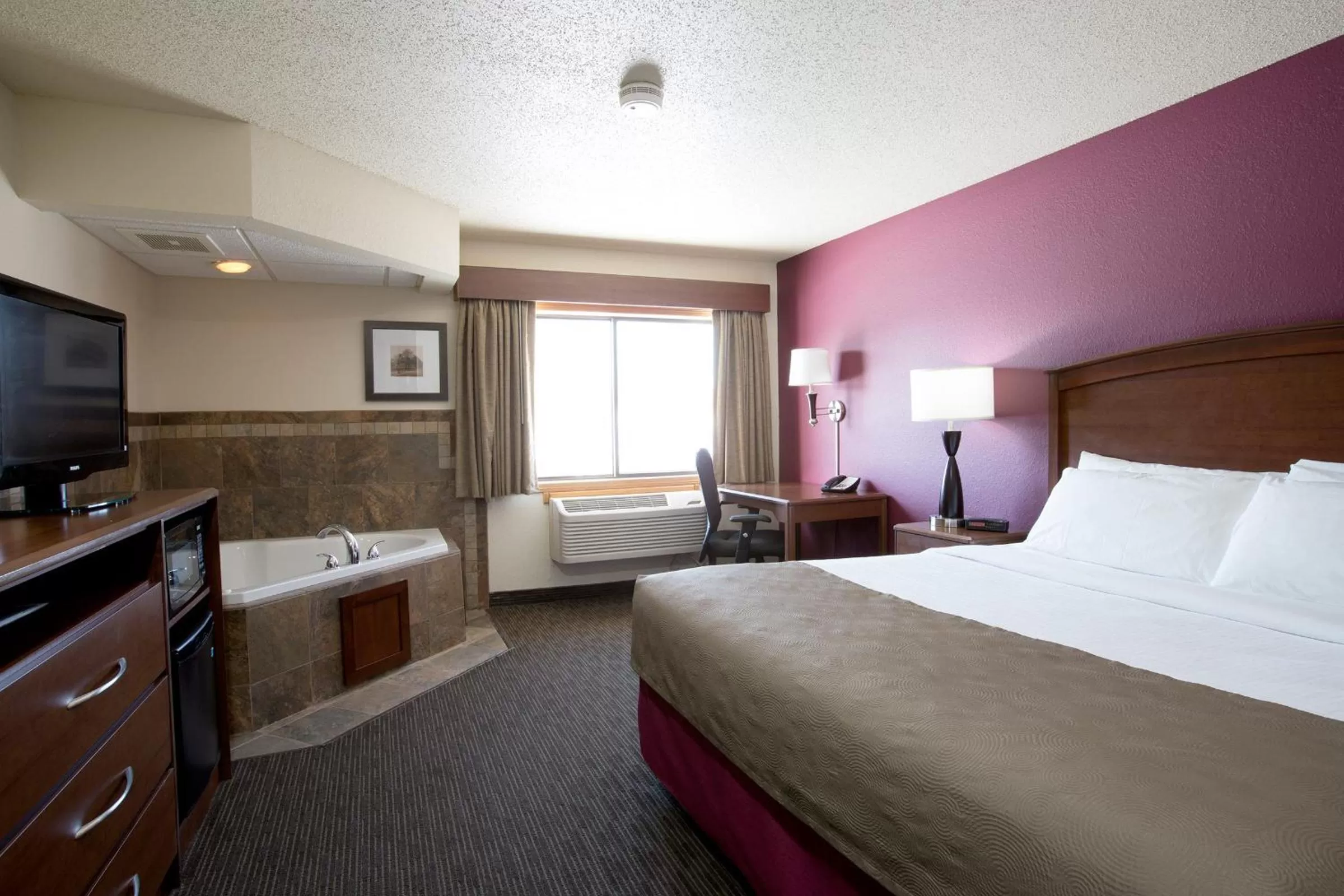 Premier King Suite - Non-Smoking in AmericInn by Wyndham Medora