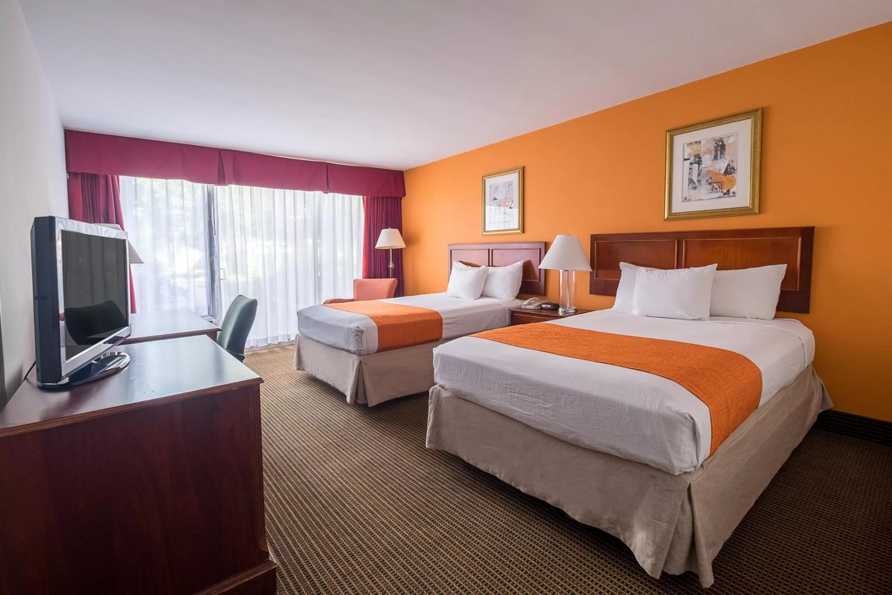 Room with Two Double Beds and Pool View - Non-Smoking in Howard Johnson by Wyndham Fullerton/Anaheim Conference Cntr