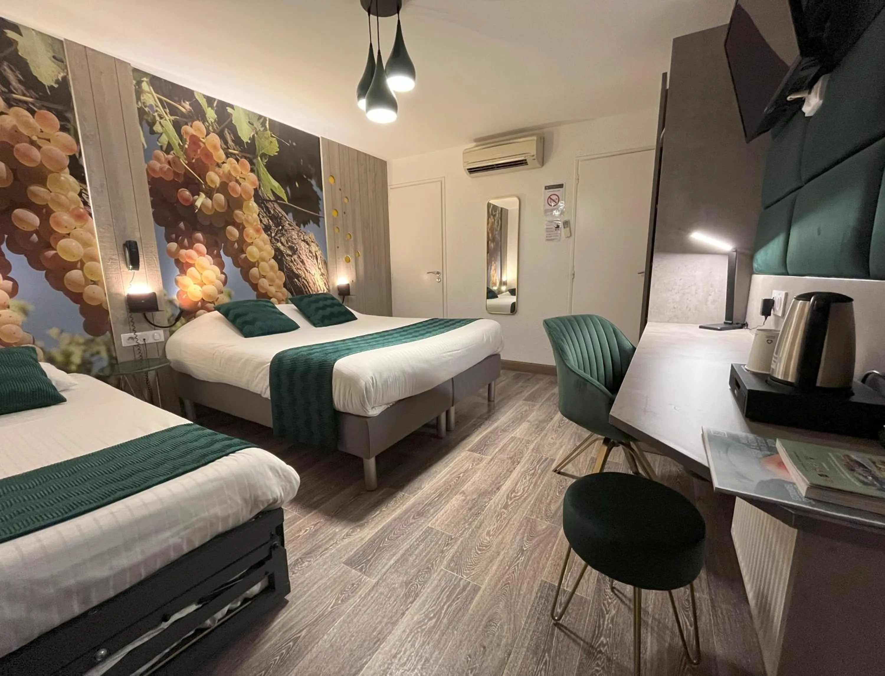 Quadruple Room with 1 Double Bed and 2 Single Beds in Cit'Hotel Le Cheval Blanc, Cognac Centre