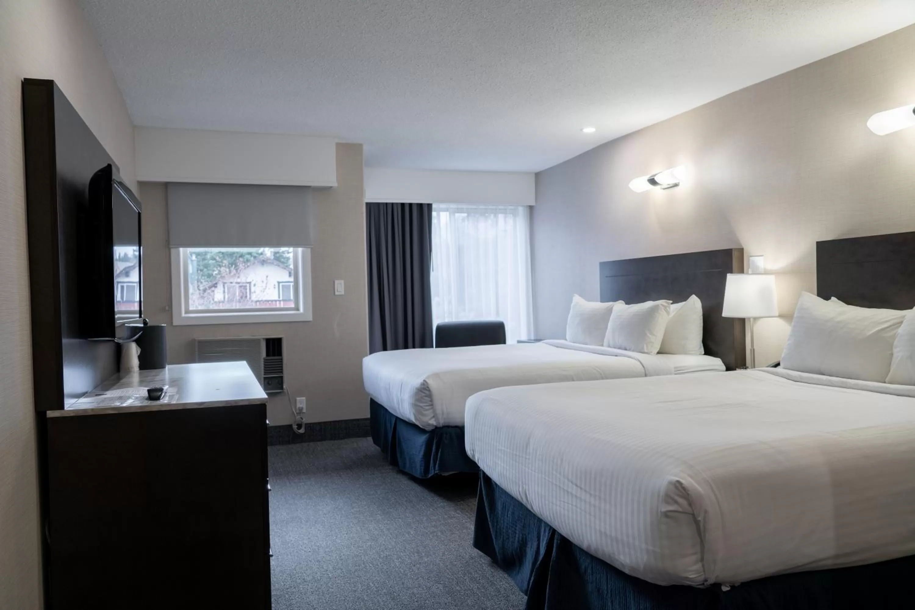 Standard Two Queen Room in Red Carpet Inn