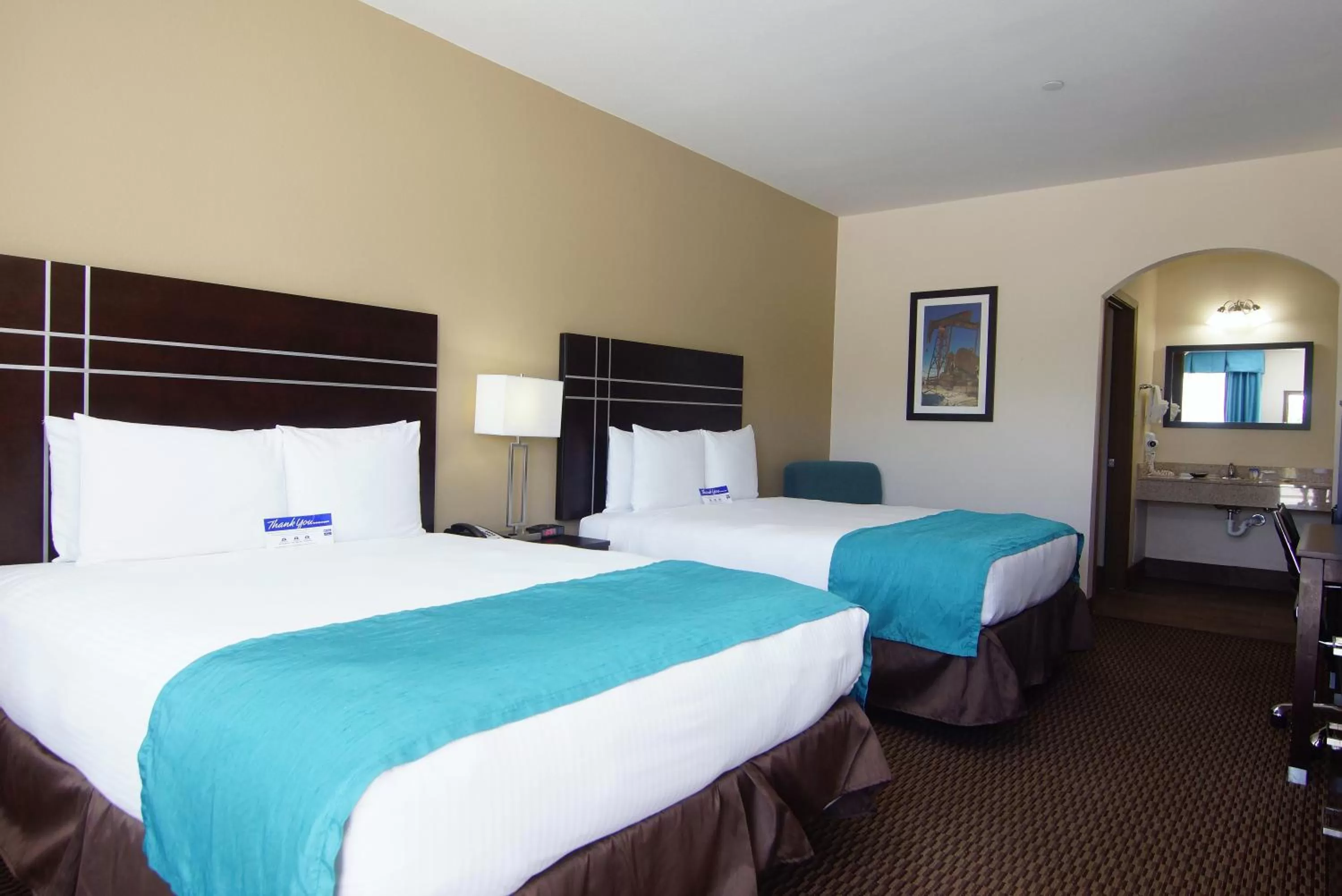 Queen Room with Two Queen Beds - Non-Smoking in Americas Best Value Inn Cuero