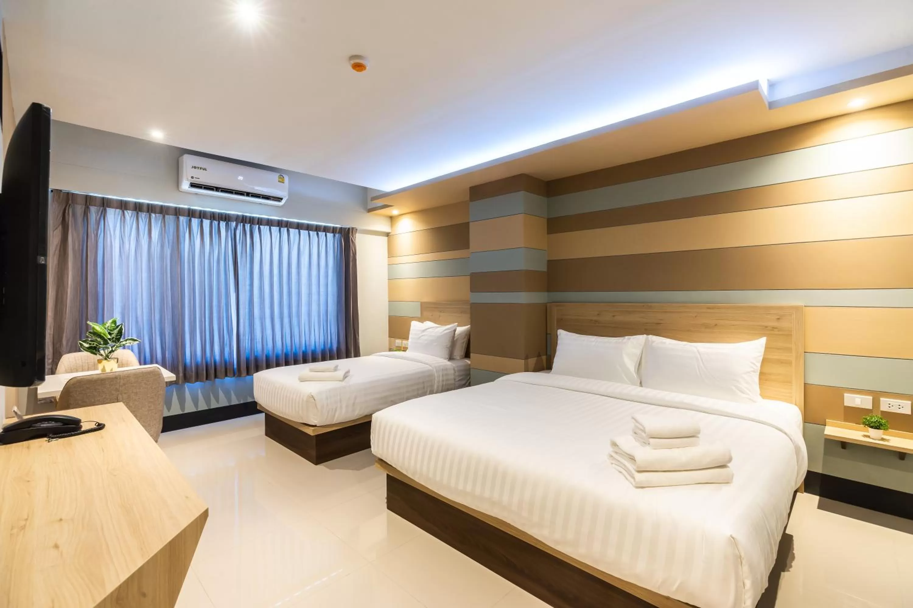 Deluxe Triple Room in Hi Sotel Victory Monument